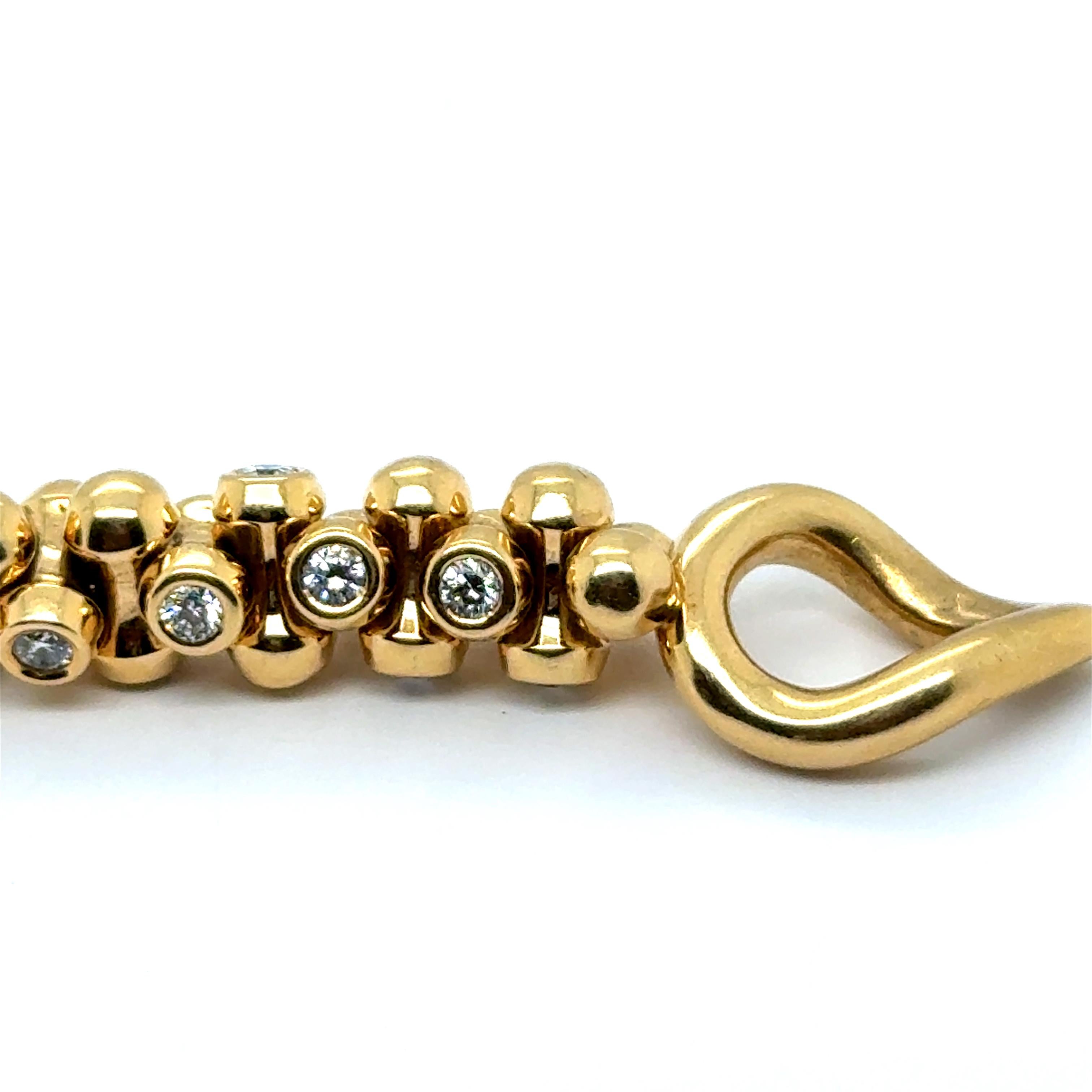 Armband aus 18 Karat Gelbgold mit Diamanten von Tamara Comolli 3