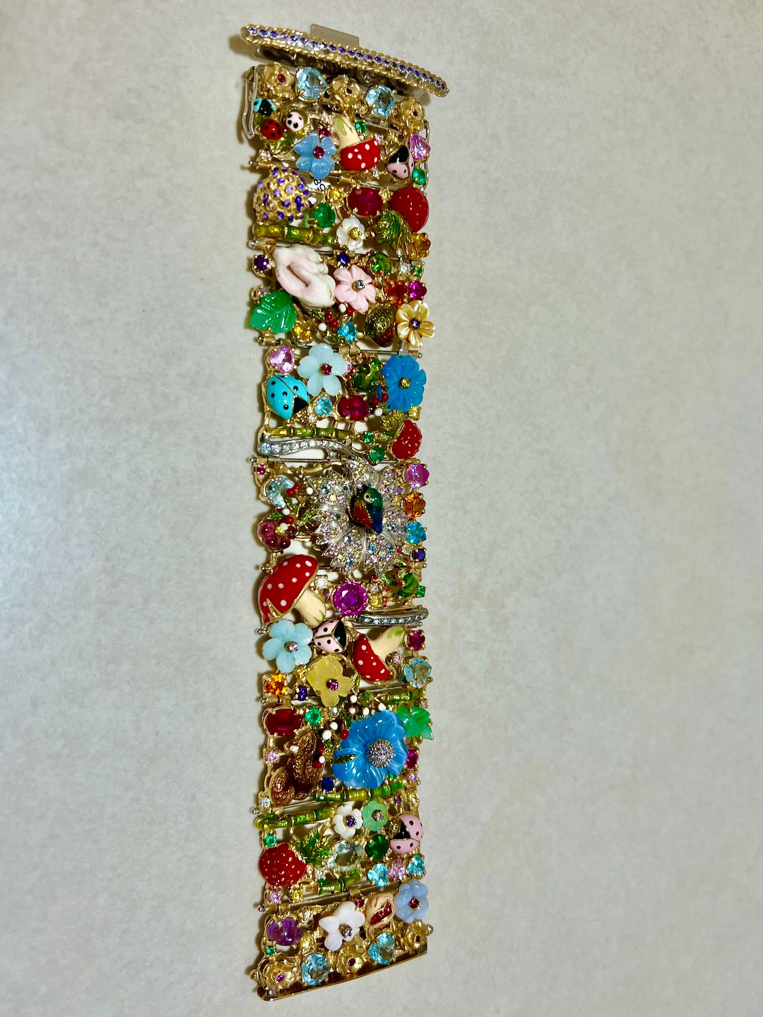 Bracelet Paradiso in 18kt  yellow gold with enamel, diamonds and different color stones (ruby, sapphire, emerald, tourmaline), one of a unique piece from the Italien designer Santagostino.
