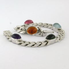 Bracelet with garnet, tourmaline, aquamarine, and amethyst 18k gold 41.9 grams