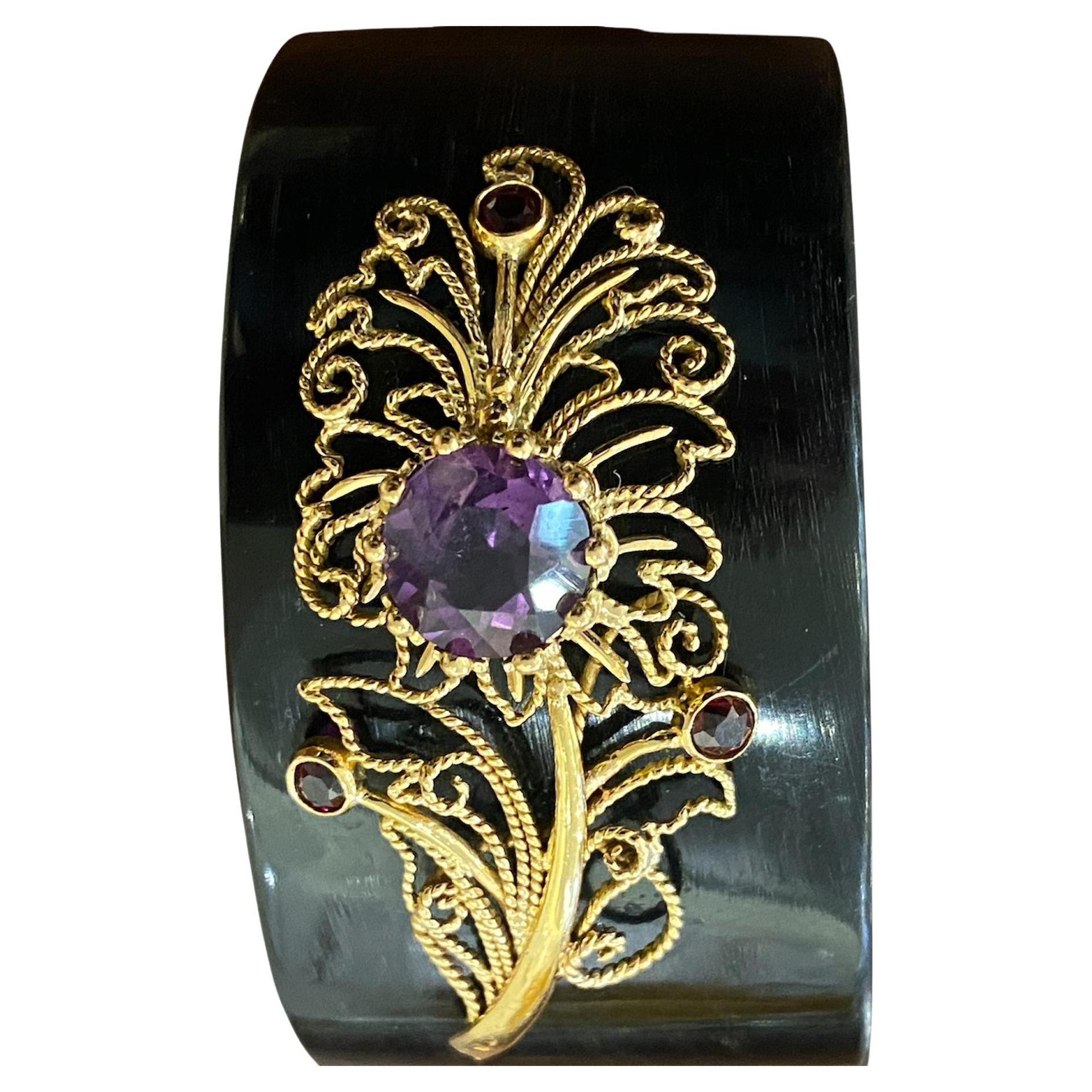 Bracelet with gold application, amethyst, and quartz on horn material