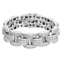 Bracelet with Invisibly Set Princess and Round Cut Diamonds in 18k White Gold