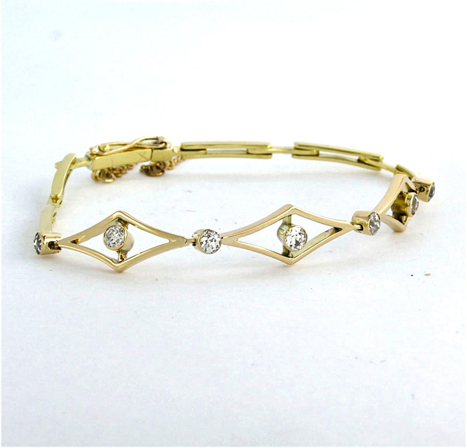 Bracelet en or bicolore 14k serti d'un diamant poli taille ancienne jusqu'à 1.00ct - G/H - SI - 19.5 cm de long

description détaillée :

le bracelet mesure 19,5 cm de long et 8,2 mm de large

poids 9,7 grammes

set avec

- 7 x 2,7 mm - 3,0 mm