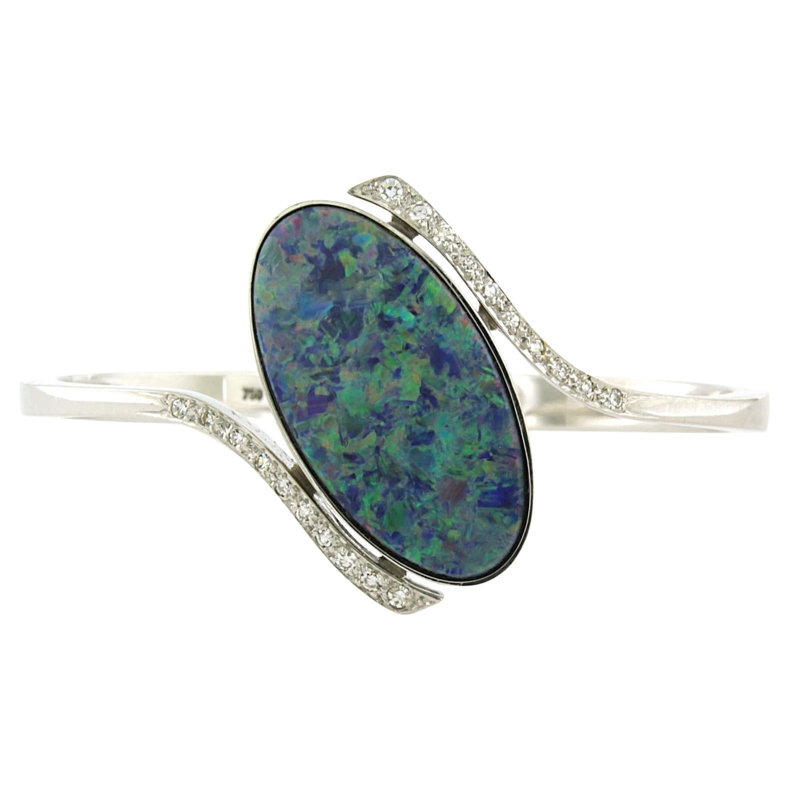 Bracelet with opal and single cut diamond up to 0.40ct 26.4 grams 18k white gold