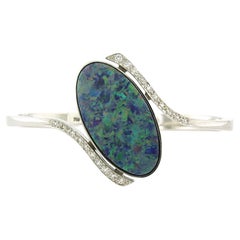 Bracelet avec opale et diamants taille unique jusqu'à 0,40ct Or 18k 26,5 grammes