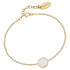 Delicate gold bracelet with natural white opal