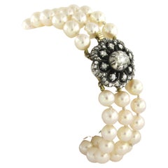 Bracelet with pearls and diamonds 14k yellow gold and silver