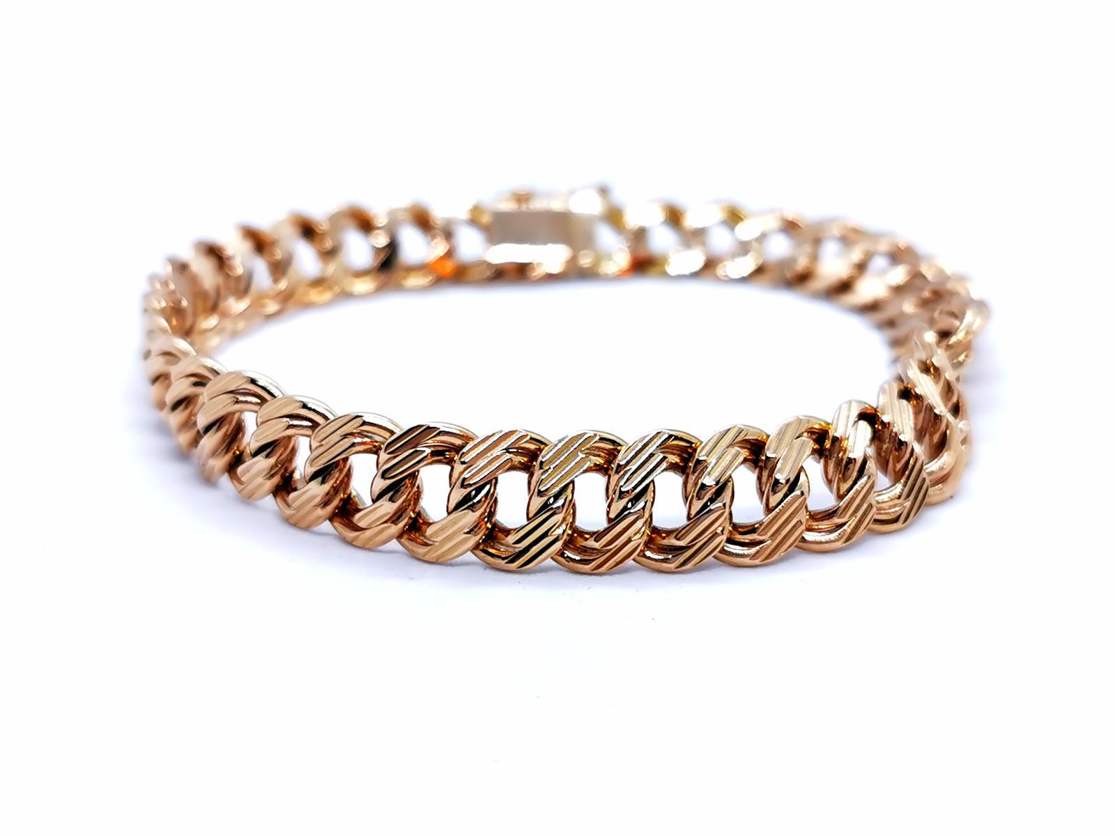 Yellow gold bracelet 750 mils (18 carats). massive mesh clasp with eight safety. length: 19.5 cm. width: 0.89 cm. depth: 0.3 cm. total weight: 28.95 g. punch eagle head. excellent condition
