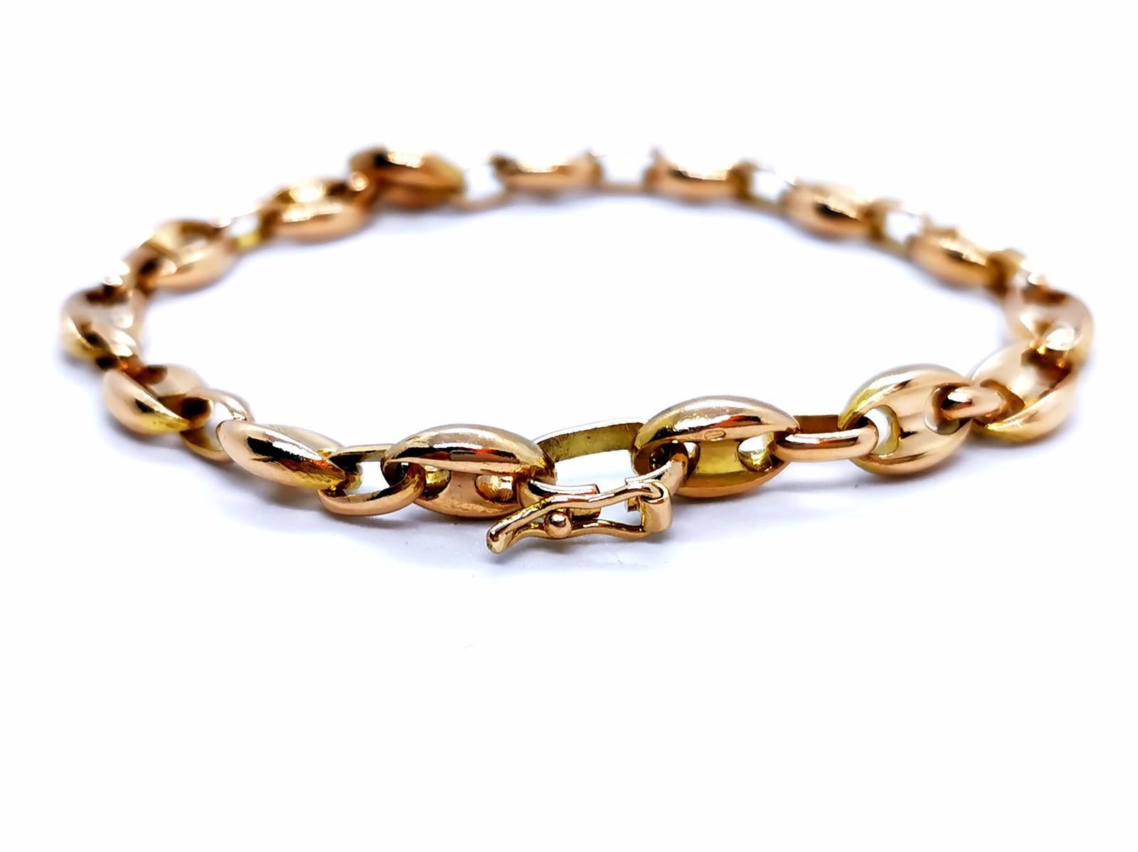 Yellow gold bracelet 750 mils (18 carats). coffee bean mesh. solid. length: 18.5 cm. width: 0.6 cm. depth: 0.3 cm. a grain dimensions 0.95 cm x 0.6 cm. with eight safety clasp. total weight: 16.80 g. punch eagle's head. excellent condition
