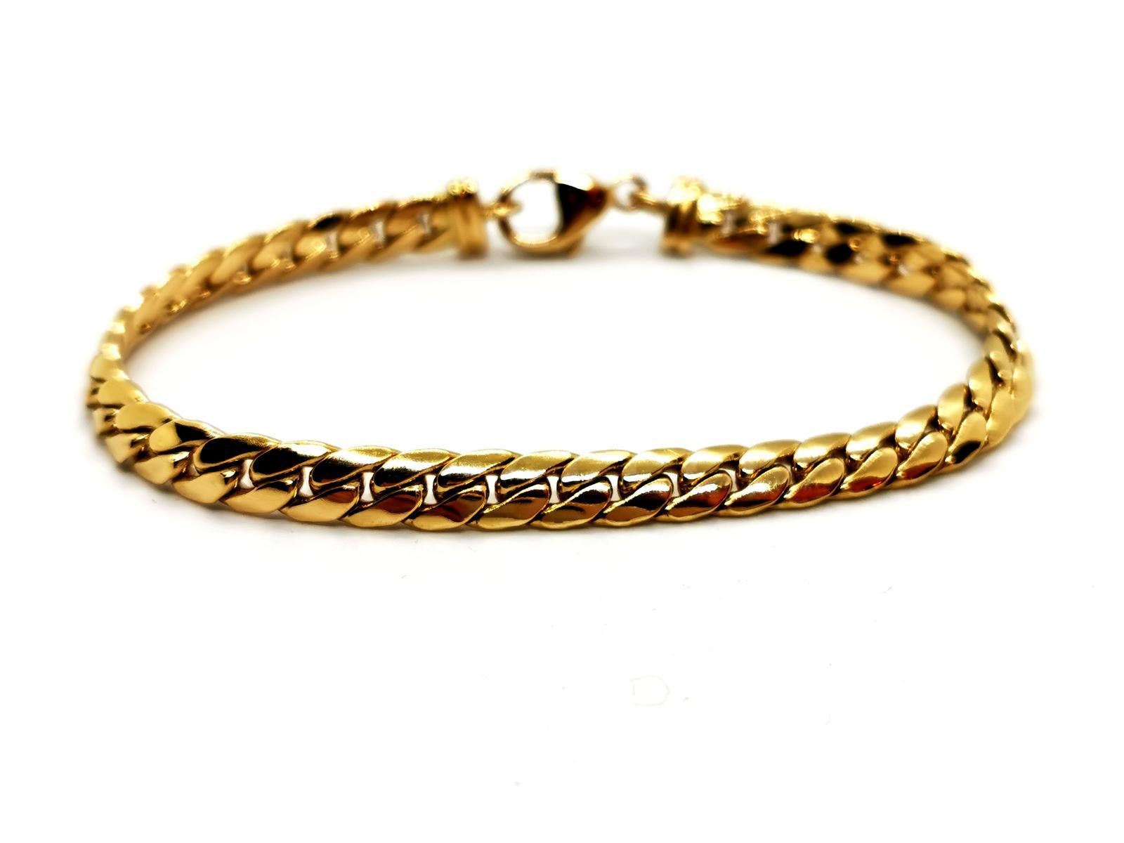 Bracelet Yellow Gold 750 thousandths massive English mesh. length: 18 cm. width: 0.53 cm. thickness: 0.19 cm. total weight: 18.20 g. eagle punch head. excellent condition
