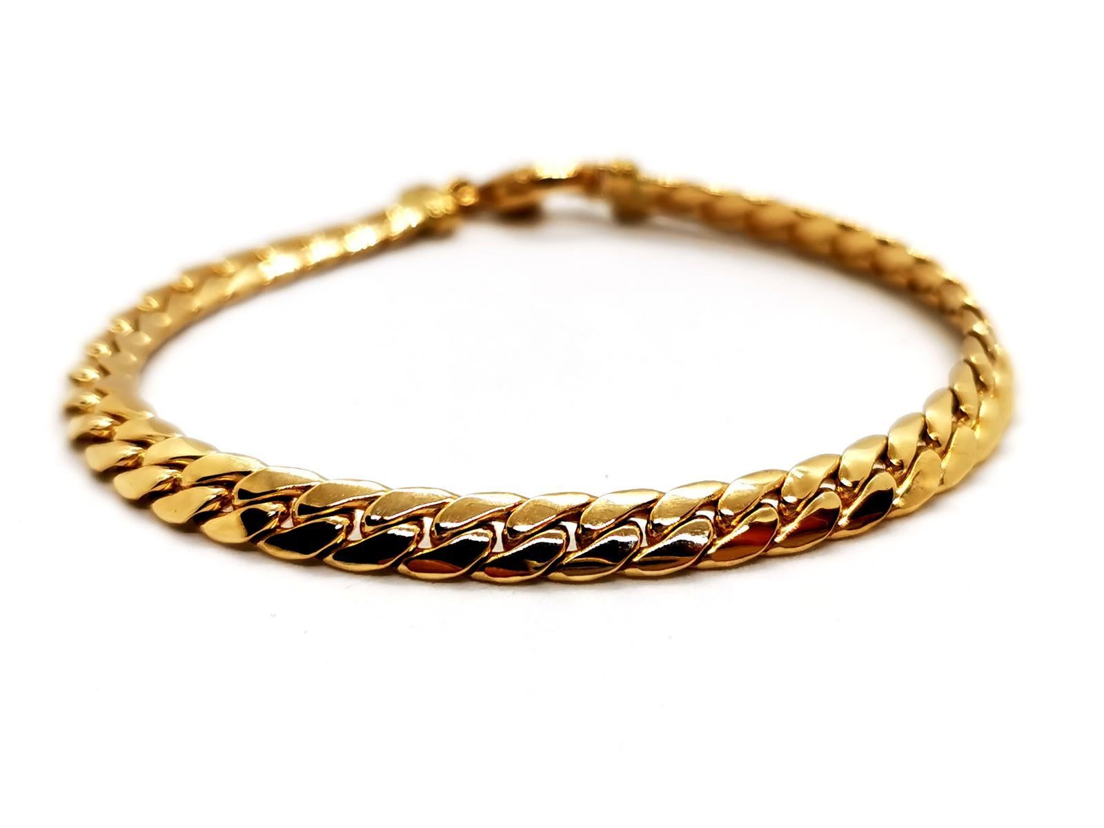 Bracelet Yellow Gold 750 thousandths massive English mesh. length: 18 cm. width: 0.52 cm. thickness: 0.19 cm. total weight: 18.31 g. eagle punch head. excellent condition
