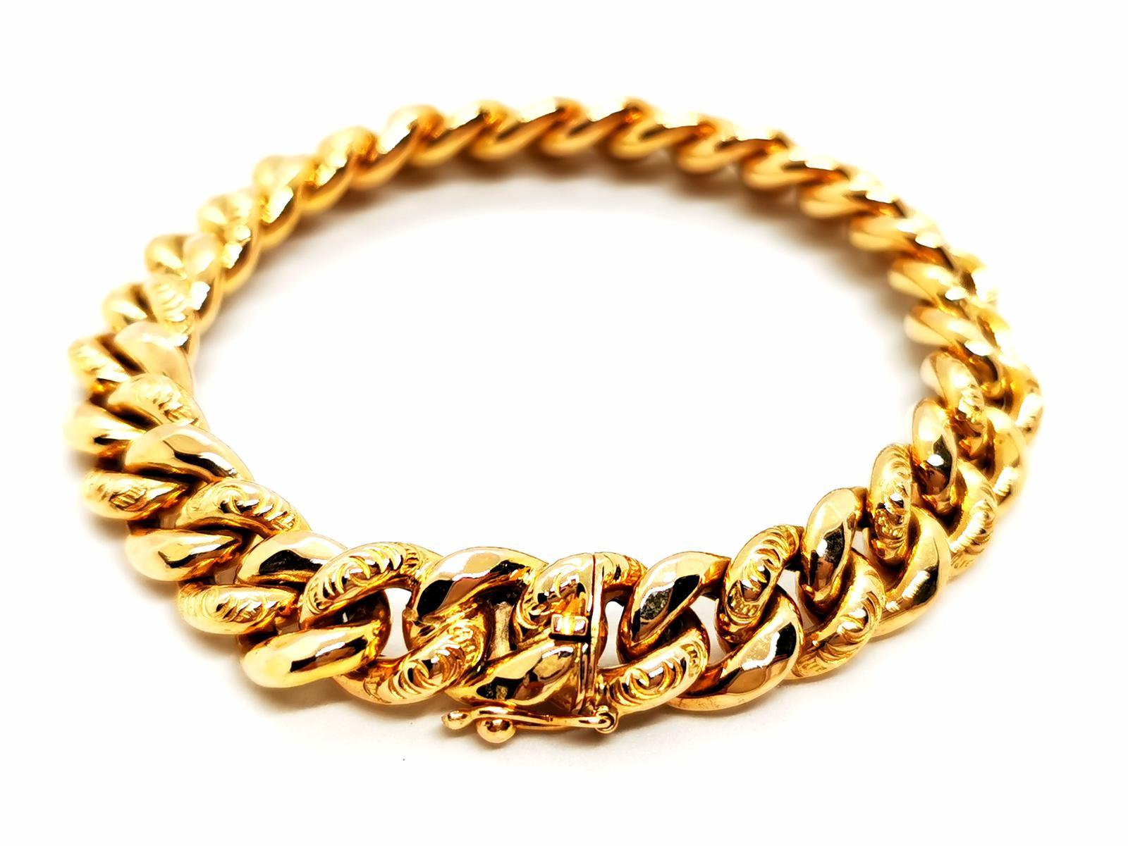 Bracelet in yellow gold 750 thousandths (18 carats). gourmet mesh with eight safety. length: 19 cm. width: 0.86 cm. total weight: 20.25 g. eagle head hallmark. excellent condition.
