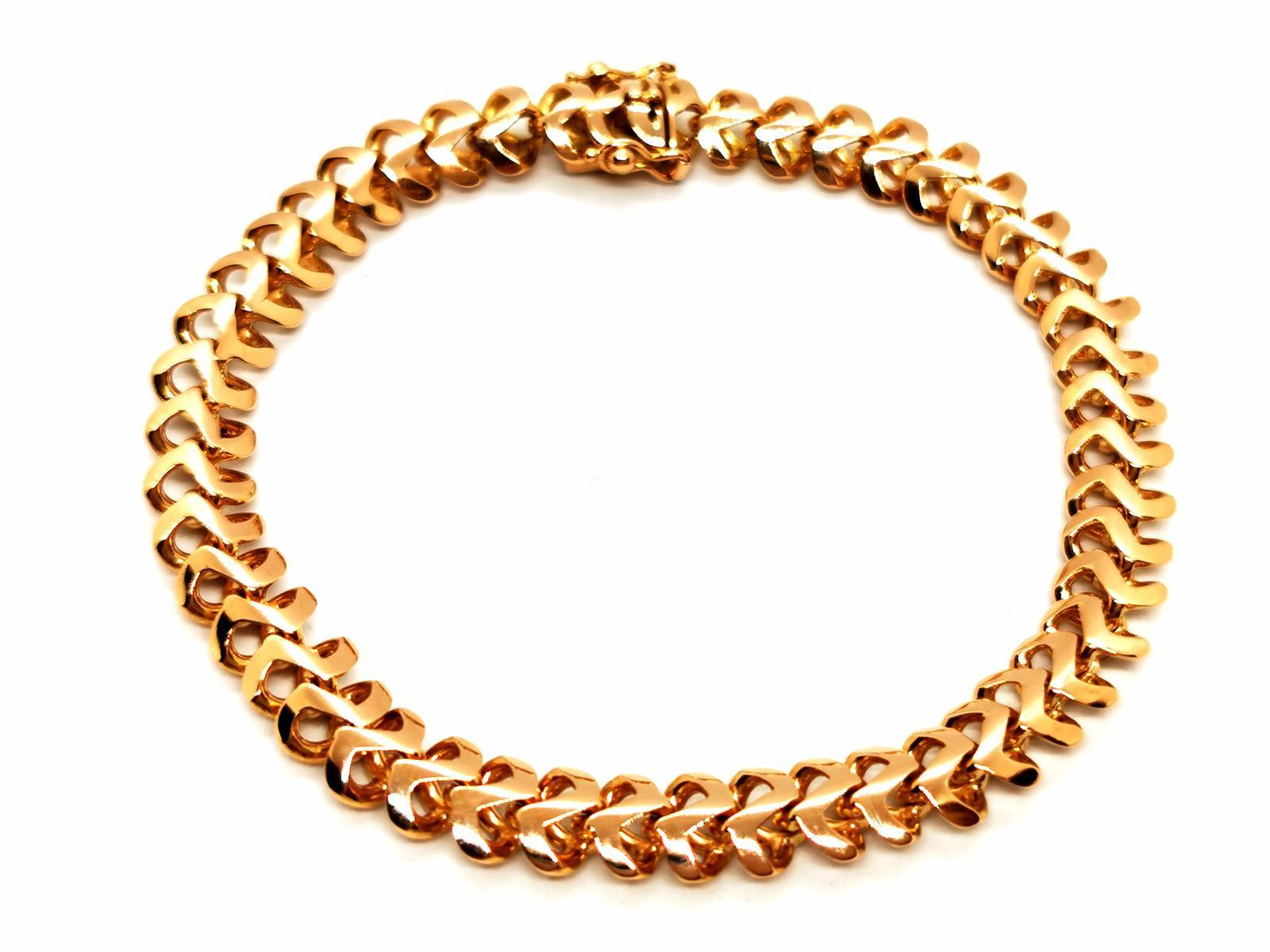 Bracelet in yellow gold 750 thousandths (18 carats). fancy mesh. ratchet clasp in eight safety. length: 19.5 cm. width: 0.73. total weight: 23.78 g. eagle head hallmark. excellent condition.
