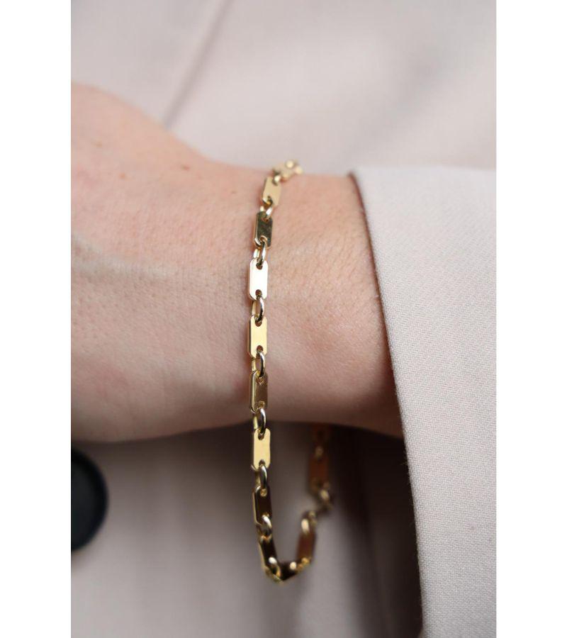 Bracelet in yellow gold 750 thousandths (18 carats). flexible chain. wrist size: 21 cm. width: 0.4 cm. Total weight: 10.76 g. Owl hallmark. Excellent condition
