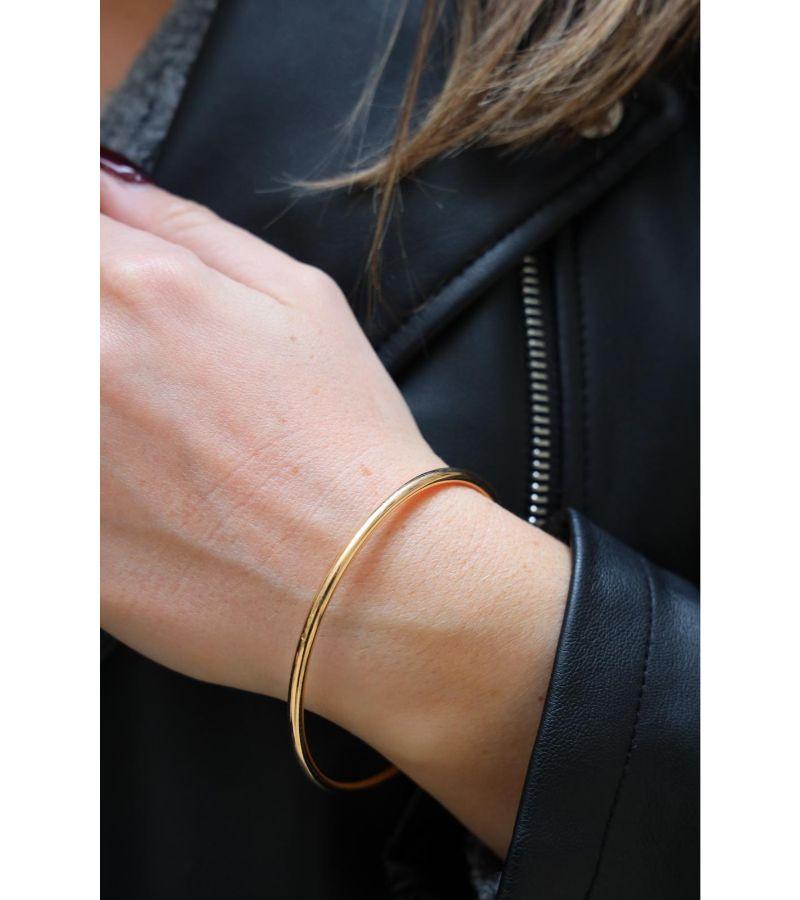 Bracelet rush. in yellow gold 750 thousandths (18 carats). round shape. round thread. solid. inner diameter: 6.3 cm. width: 0.28 cm. wrist size 20 cm. total weight: 22.52 g. eagle head hallmark. excellent condition

