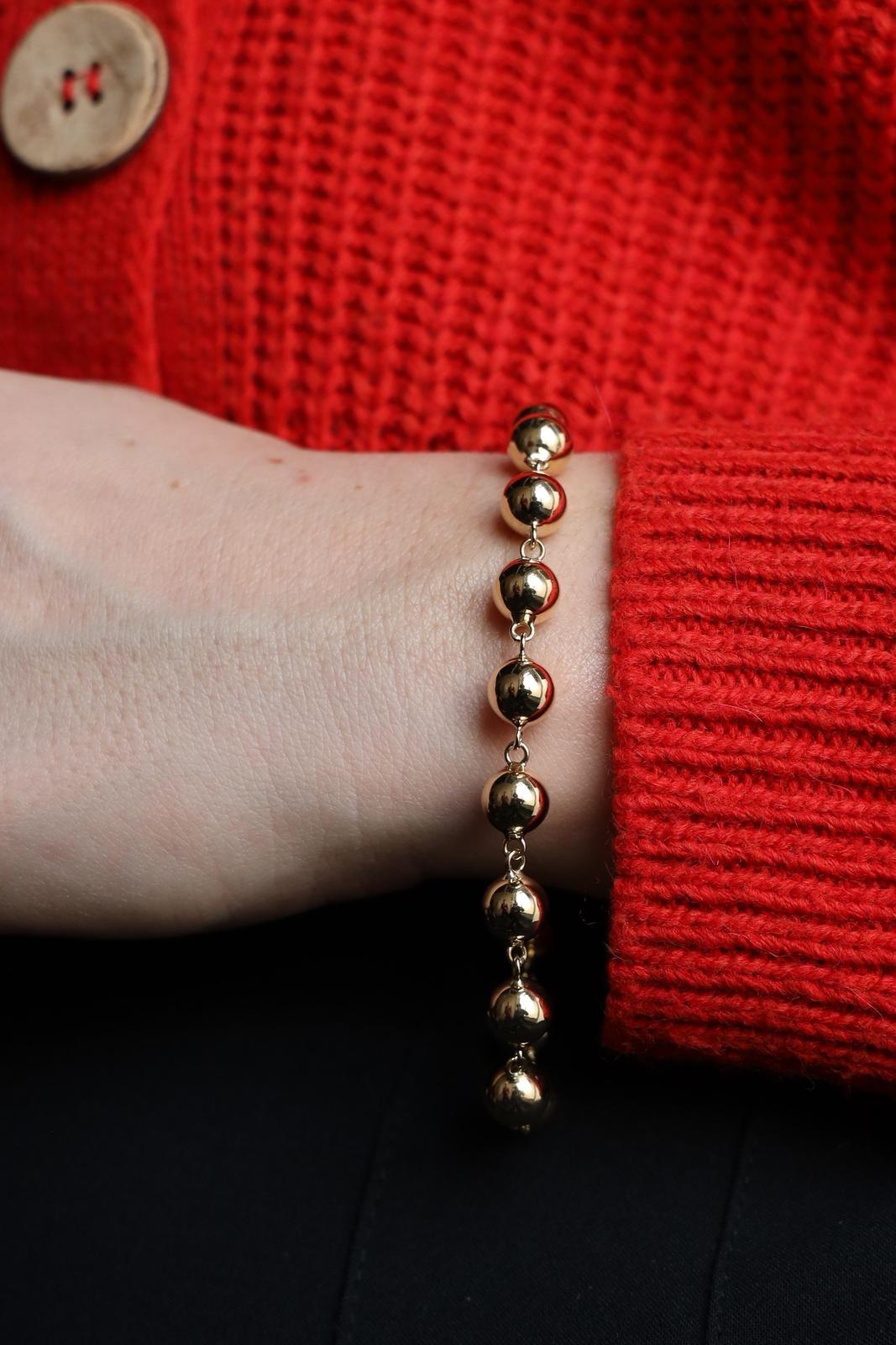 Armband Gelbgold 750 Tausendstel (18 Karat). Kugelgeflecht. Länge: 21 cm. Breite: 0,78 cm. Gesamtgewicht: 12,78 g. Adlerkopfpunze. ausgezeichneter Zustand
