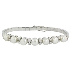 Bracelets set with pearls and diamonds 18k white gold