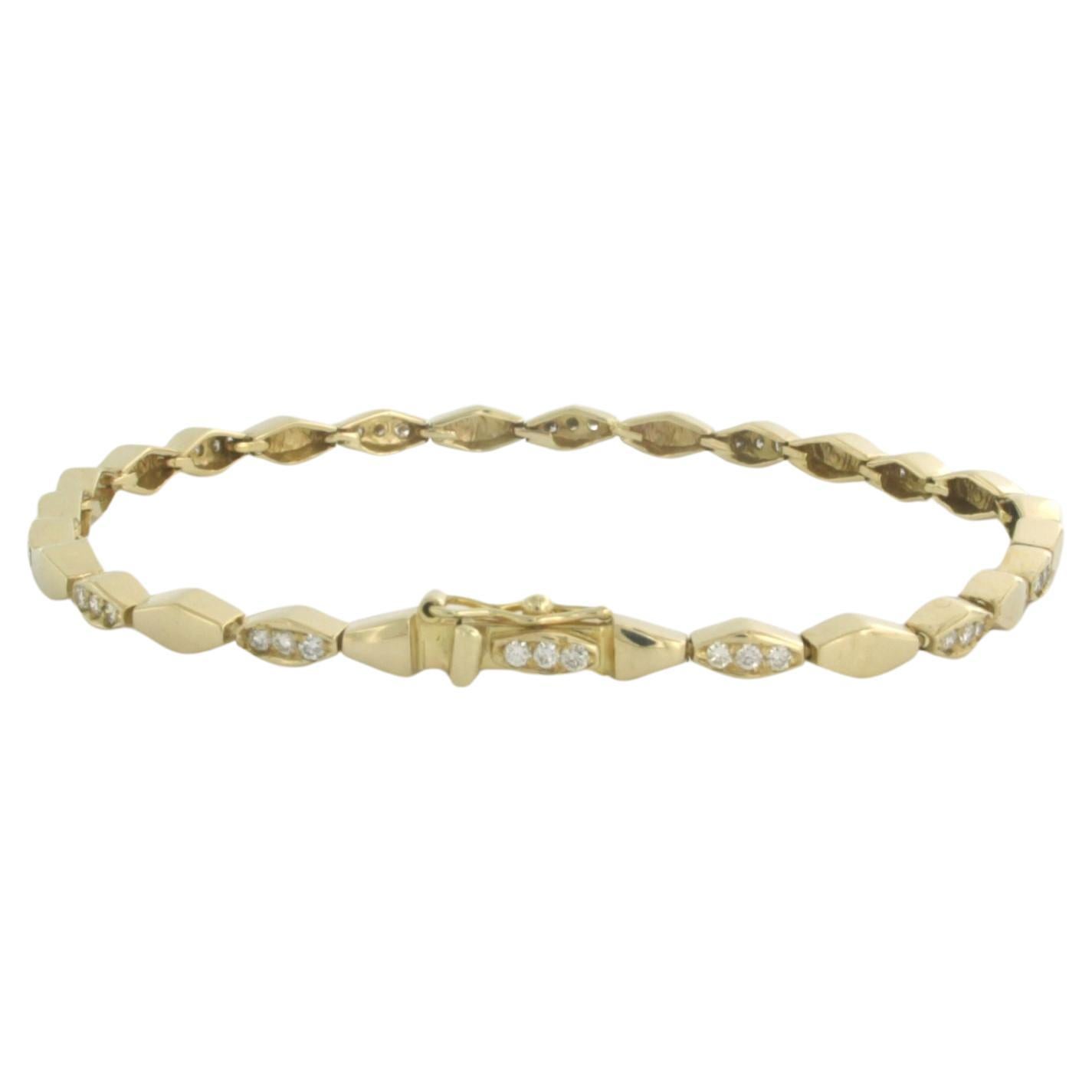 Bracelot set with brilliant cut diamonds up to 0.60ct 14k yellow gold