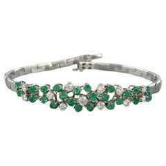 Bracelot with emerald and diamonds 18k white gold