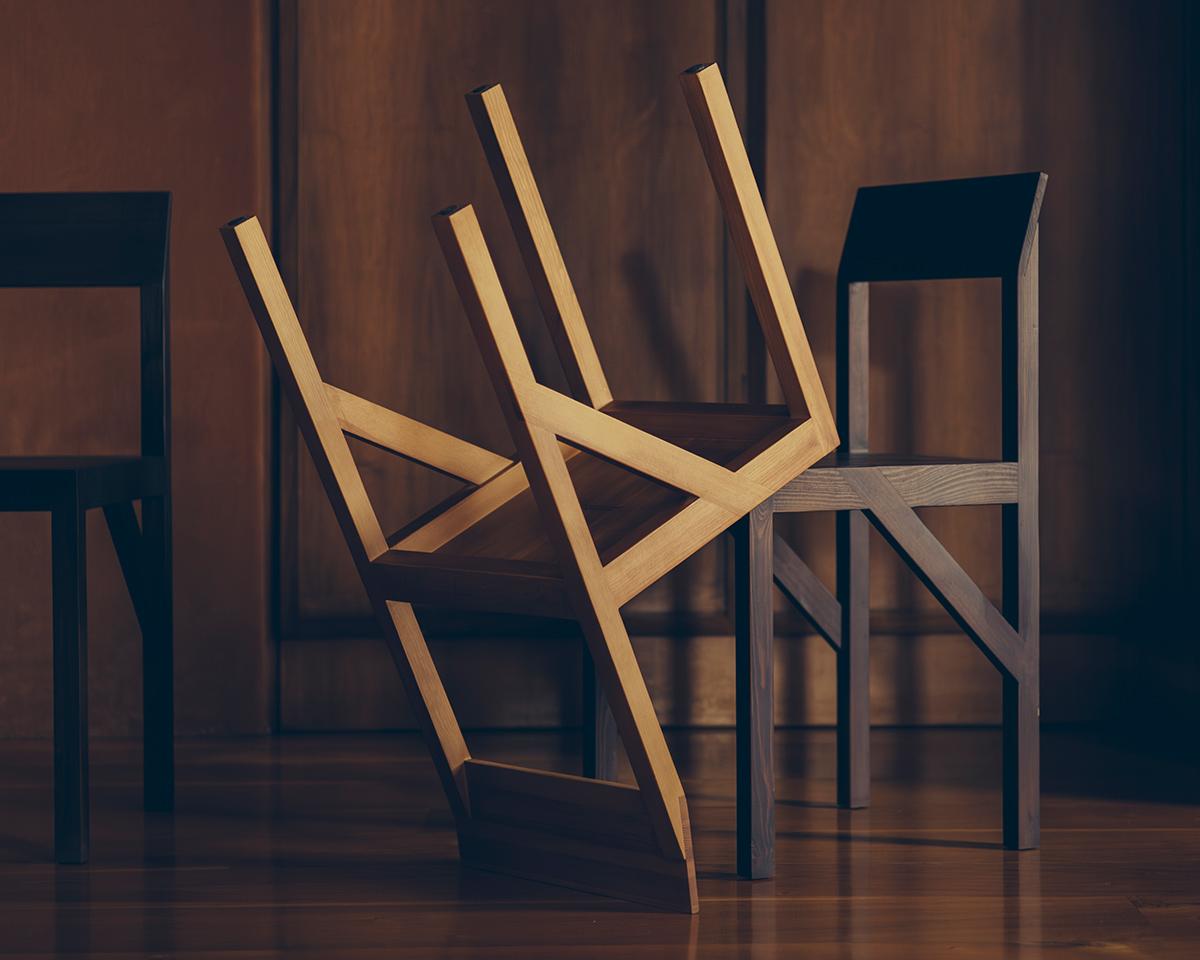 The Bracket Chair in dark pine, designed in collaboration with Copenhagen-based design studio Frederik Gustav, is a four-legged piece fabricated in solid oiled pine with a flat seat and a slightly angled back-rest highlighted by a structural