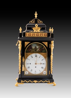 “Bracket” table clock with automata and chime. Spencer & Perkins.