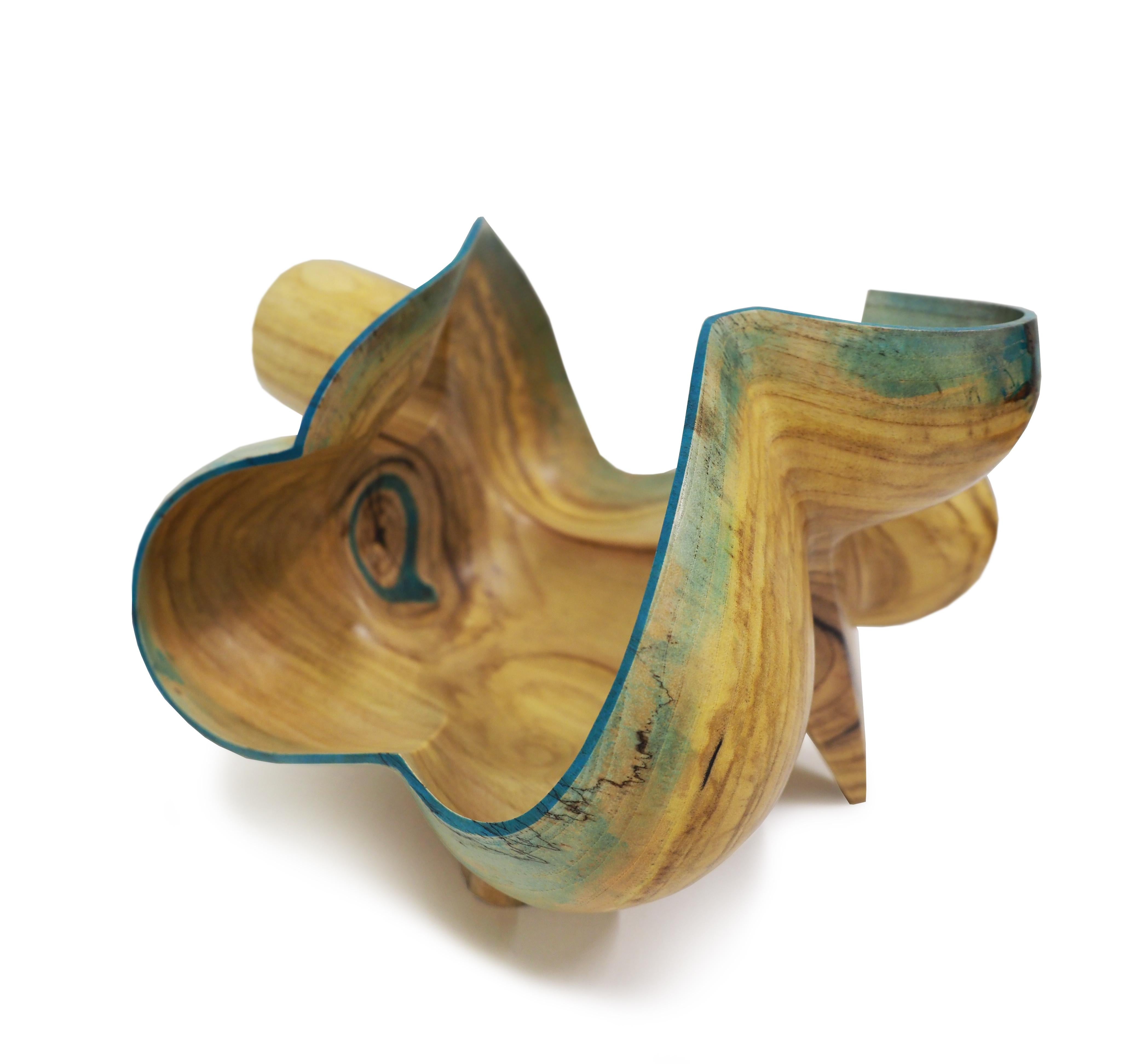 Experiment in Time + Space is a beautiful sculpture made from spalted yellowwood burl with hand tint.