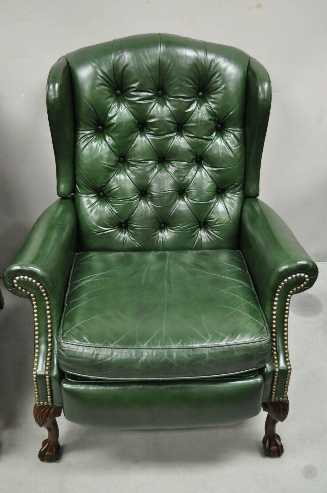 Bradington Young Green Leather Chesterfield Reclining Wingback Chairs - a Pair. Item features Reclining wing back frames, green button tufted leather chesterfield style upholstery, original labels, carved ball and claw feet, very nice vintage pair,