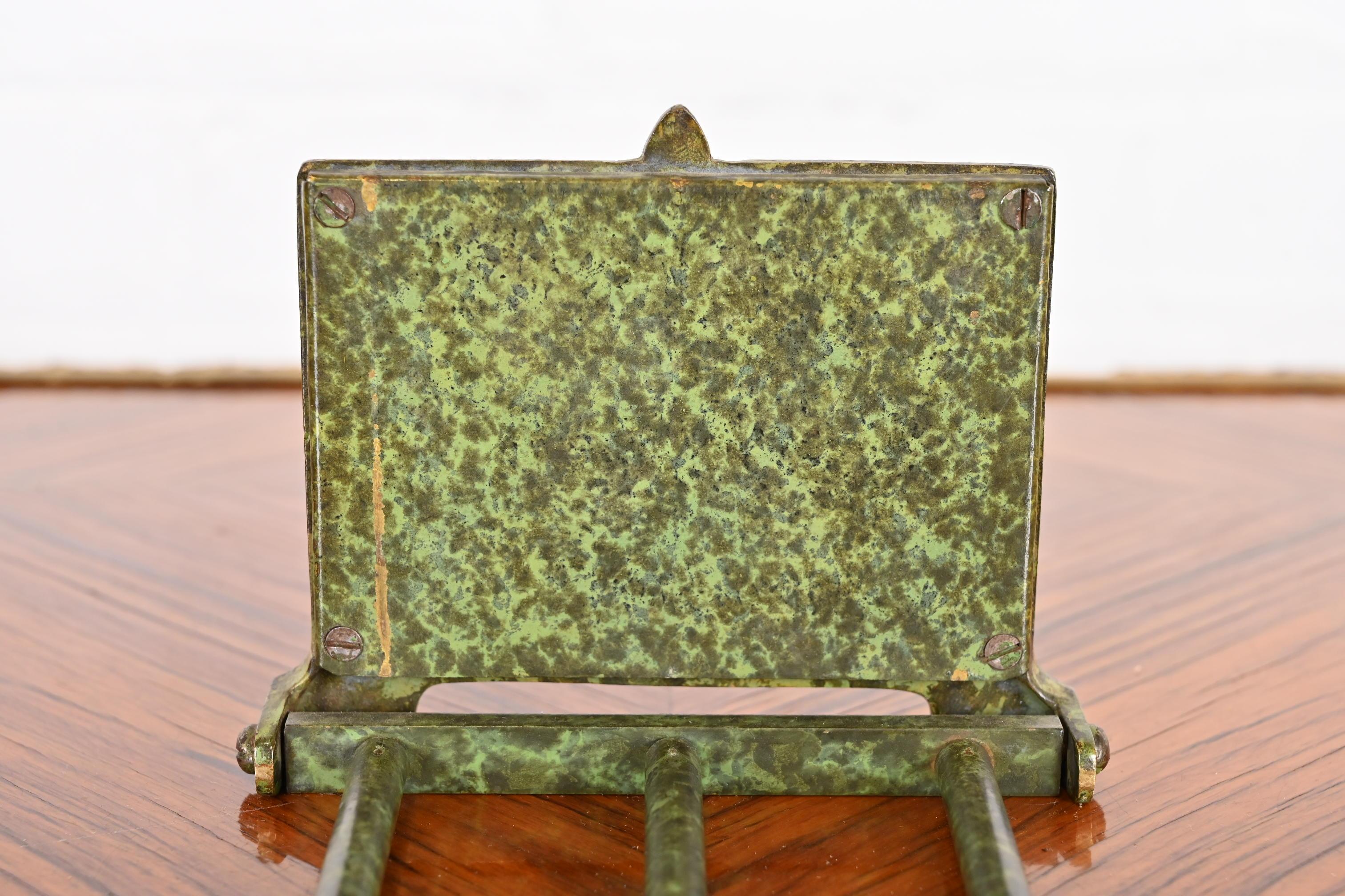 Bradley and Hubbard Art Nouveau Bronze and Slag Glass Expandable Book Rack 10