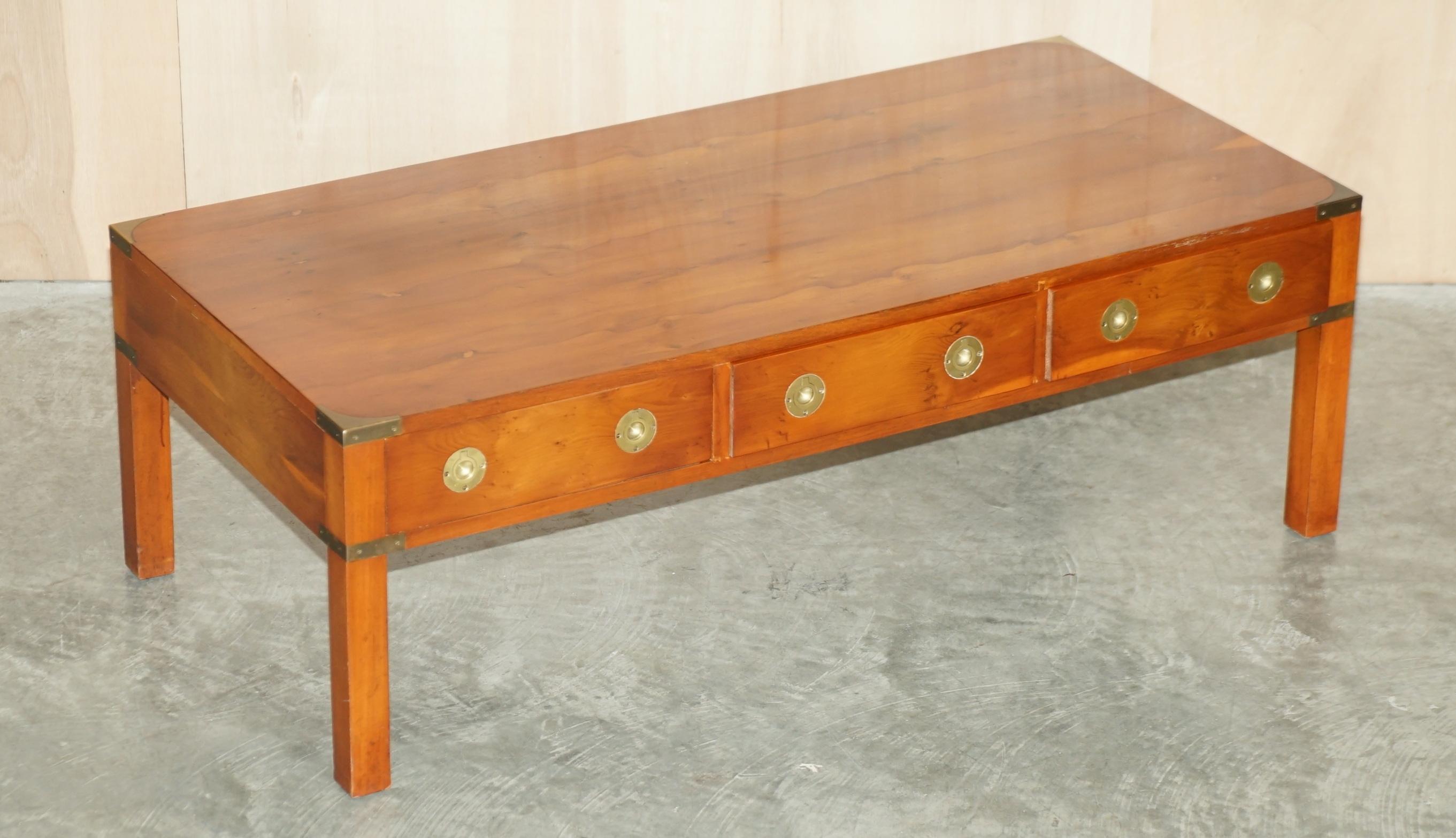 We are delighted to offer for sale this vintage collectable Burr Yew wood and Brass Bradley Furniture Military Campaign three drawer coffee table

This piece was made by Bradley furniture who were a very fine firm, they have used choice cuts of