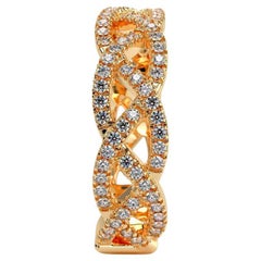 Braided 14k gold ring with moissanites.