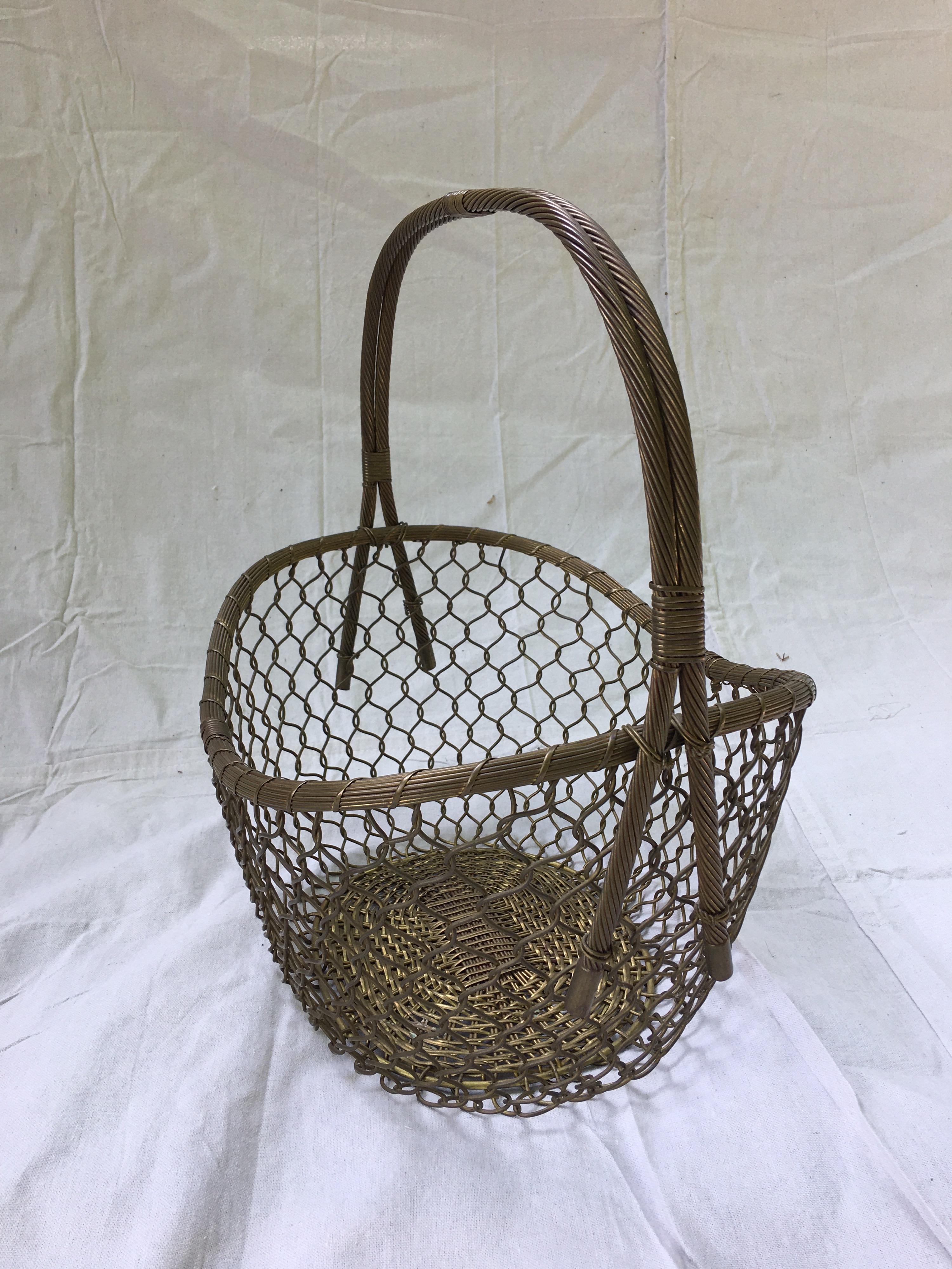 Well built woven brass basket. Nice weight, probably designed to be a magazine Basket. Possibly Italian.