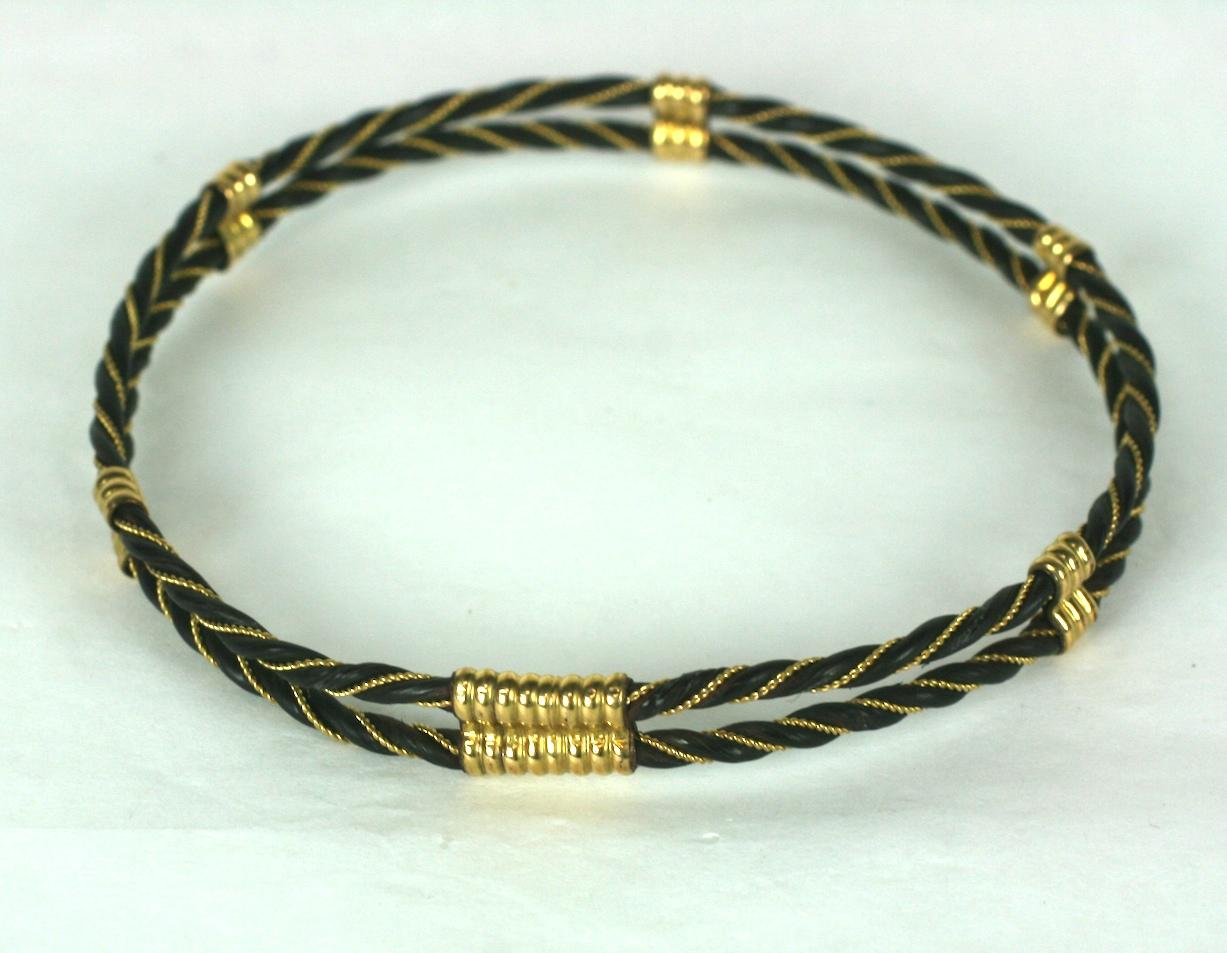 Braided gold and Elephant Hair Bracelet from the 1970's. Classic 70's vibe which became a modern classic. Braided elephants hair with gold filled fittings. Interior diameter 2.5