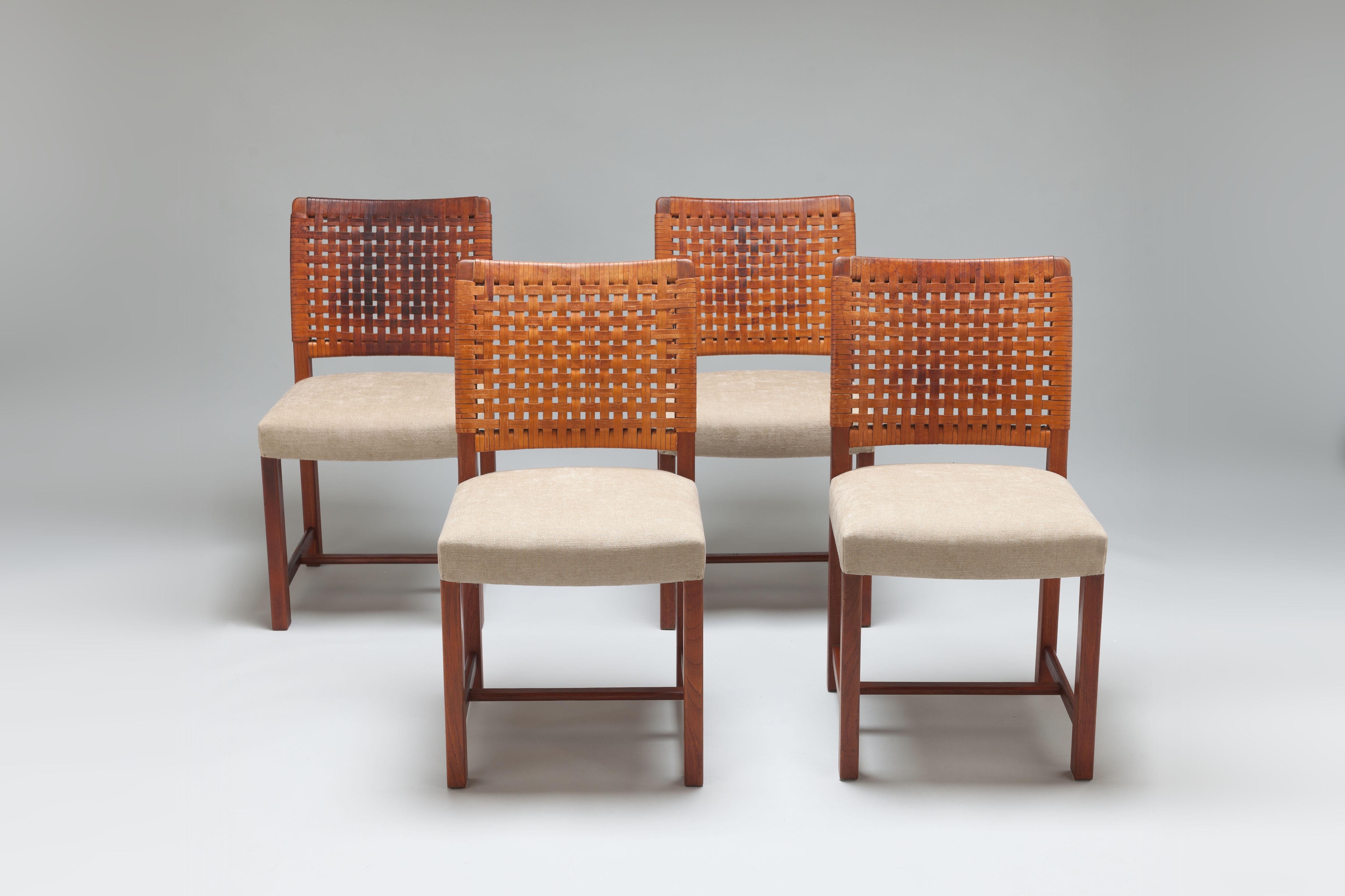 Early set of 4 vintage Näyttely chairs by Carl Gustaf Hiort af Ornäs in solid teak with natural leather braided back in original condition.

The Näyttely was commissioned by Finnish designer Carl Gustaf Hiort af Ornäs in 1955 for Finnish