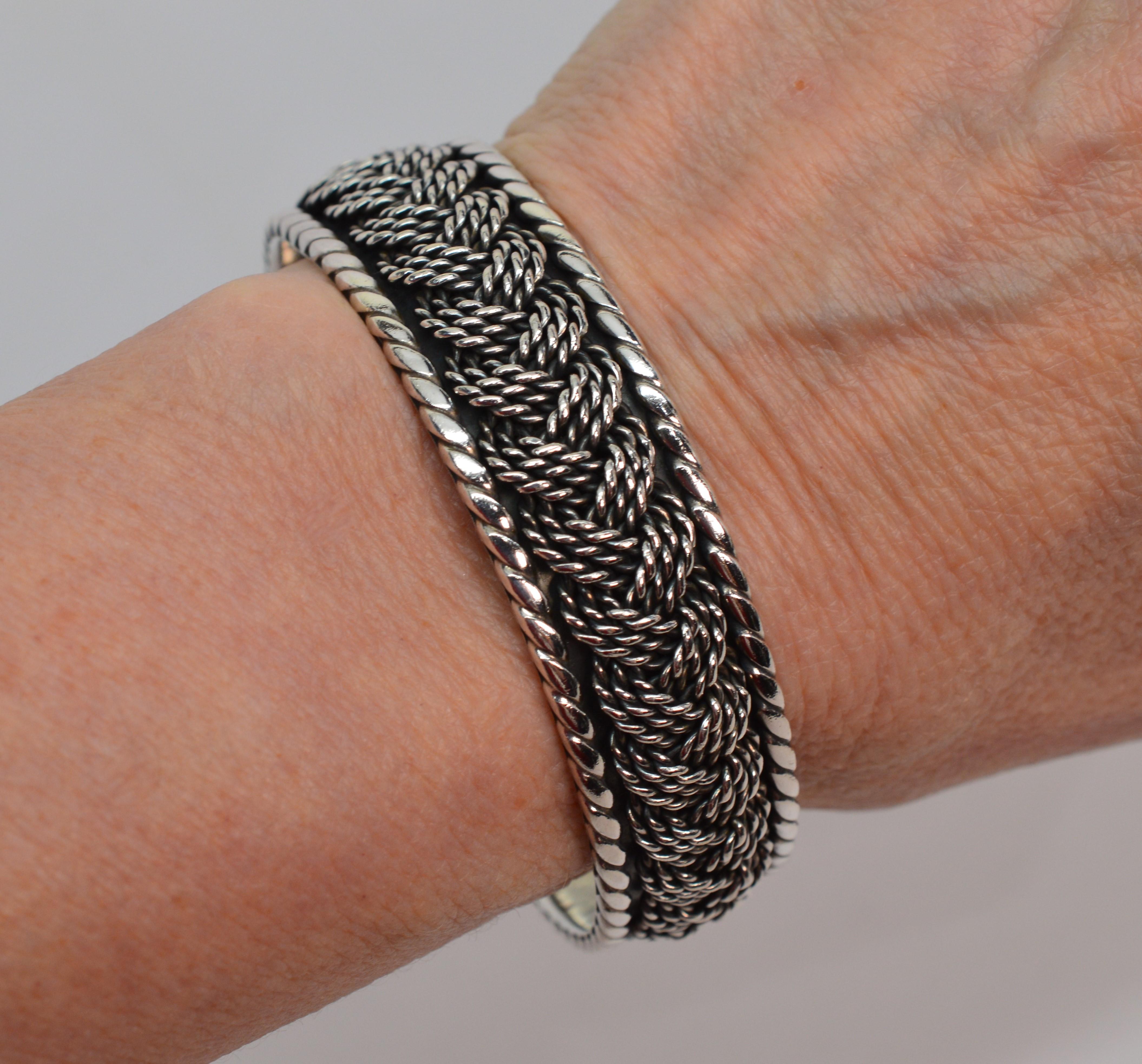 Abundant textures and dimension work in harmony on this substantial sterling silver bangle. The wholesome artisan quality, crafted in Mexico, make this bracelet notably outstanding. 
Measuring 3/4 inch wide and the bangle displays an attractive