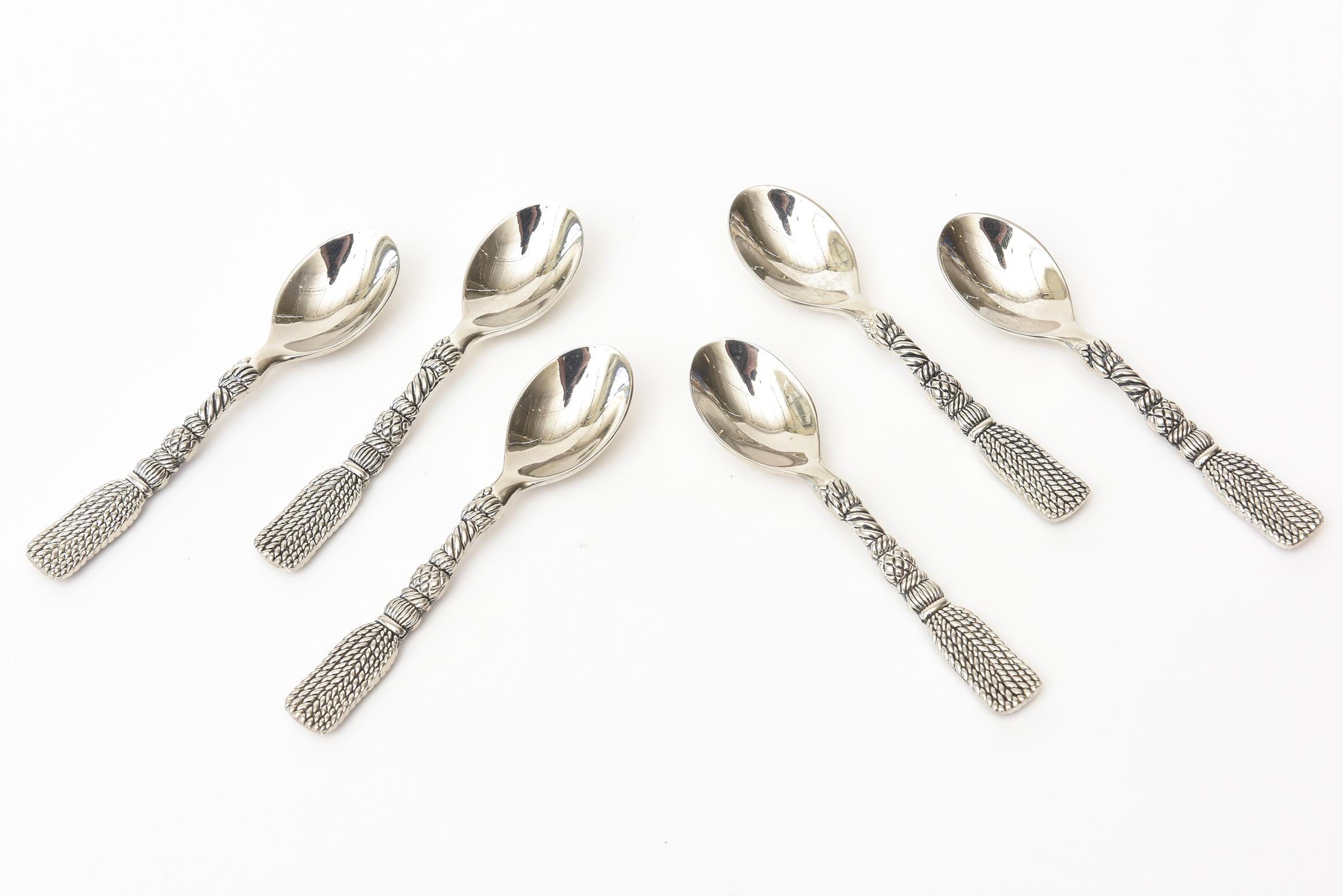 These lovely signed set of 6 stainless steel braided and tasseled roped demitasse serving spoons are signed Silen. Perfect for your morning expresso or coffee. They are from the 1970s. They have an elegance to them. Also can be used for serving.