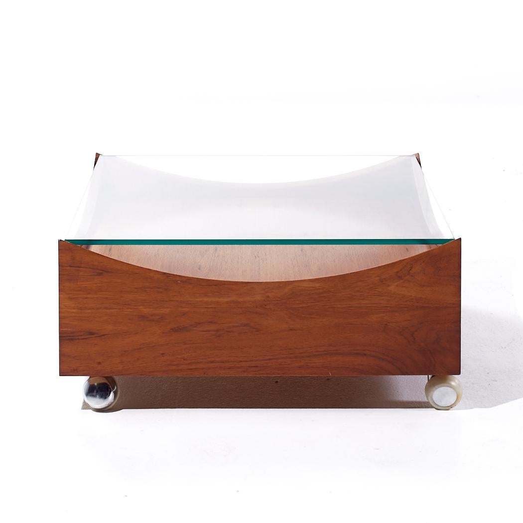 Bramin Mobler Mid Century Danish Rosewood and Glass Coffee Table

This coffee table measures: 27.5 wide x 27.5 deep x 12.5 inches high

All pieces of furniture can be had in what we call restored vintage condition. That means the piece is restored