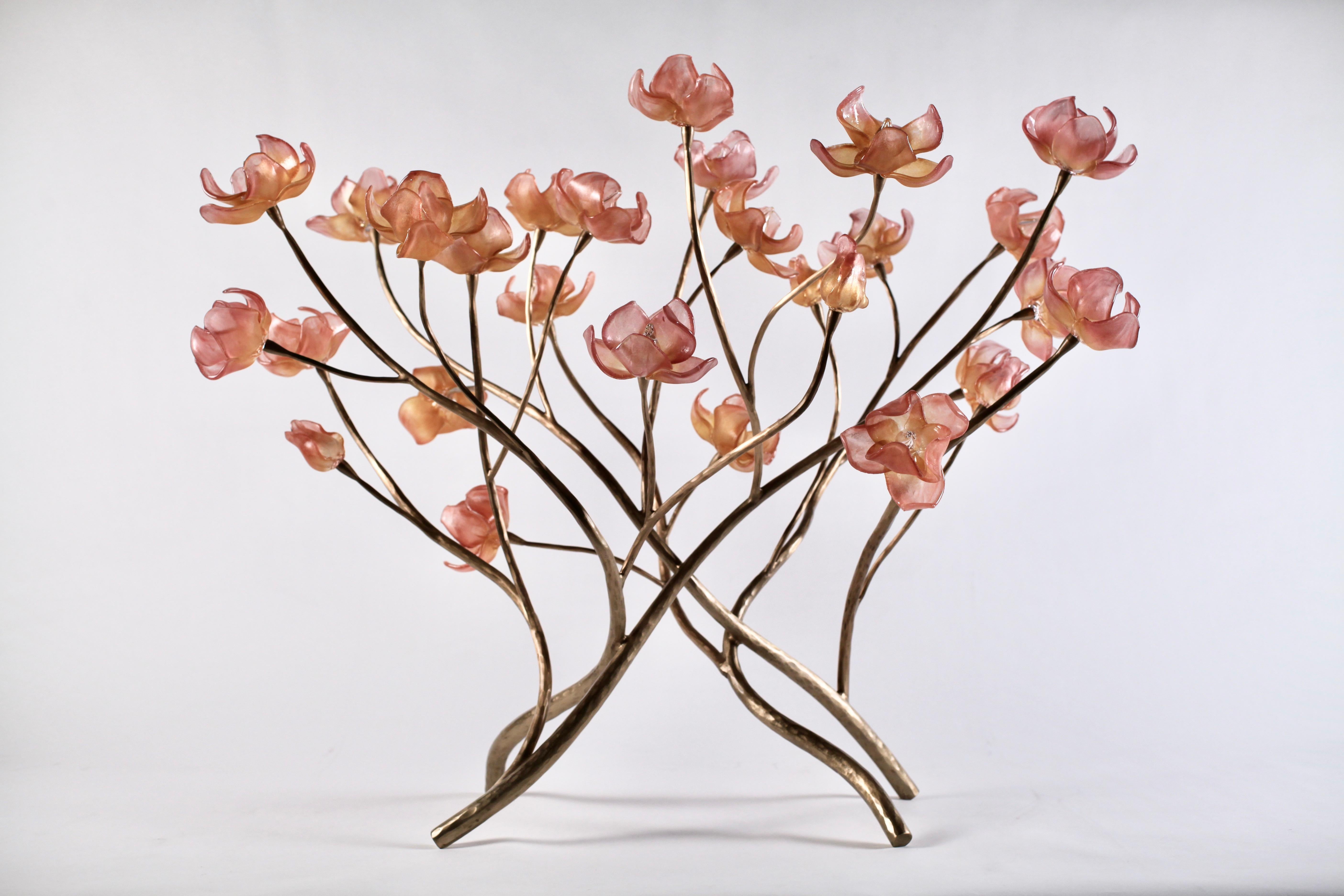 Branching Magnolia Sculpture designed and created by Elizabeth Lyons. Each one-of-a-kind piece is handmade, taking months to complete. 

Hand-blown and sculpted pink and golden glass magnolia blossoms in various stages of opening, adorn a