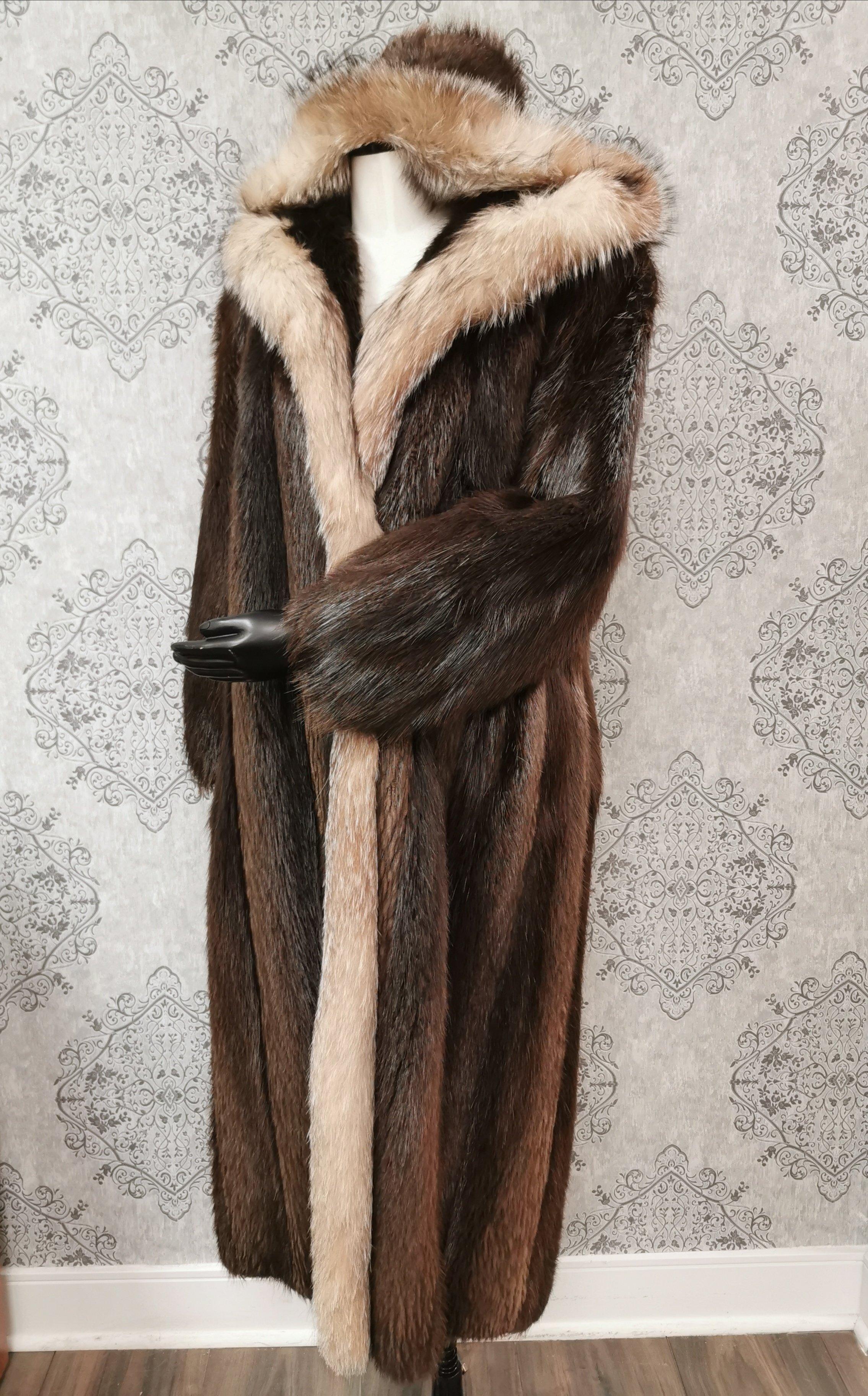 PRODUCT DESCRIPTION:

stunning Vincenzo collection Beaver fur full length coat with crystal fox fur at the front and around the hood

Condition: Like new

Closure: Hooks & Eyes

Color: Brown

Material: Beaver fur and Crystal Fox fur

Garment type: