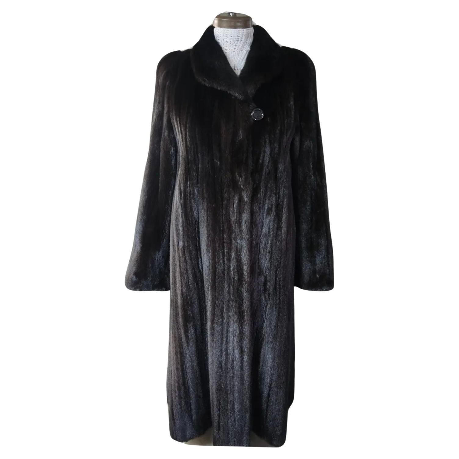 PRODUCT DESCRIPTION:

Birger Christensen Ranch female mink fur full length coat with long sleeves that can be rolled and gracious sweep

Rare piece of history, this coat has been kept in a freezing vault all its lifetime, the fur is supple and and