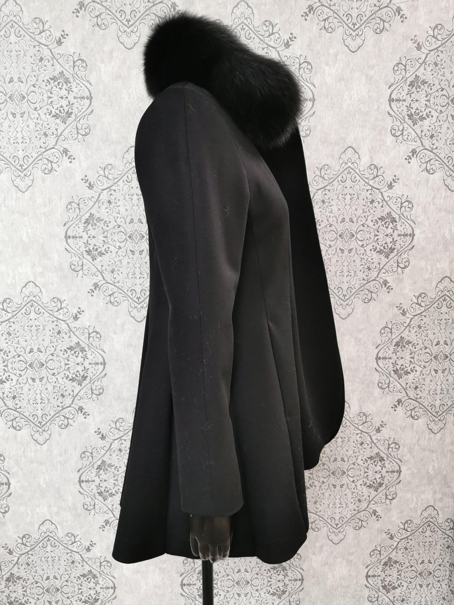 black coat with blue fur hood