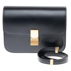 Brand New Céline Classic handbag with strap in black calfskin and gold hardware