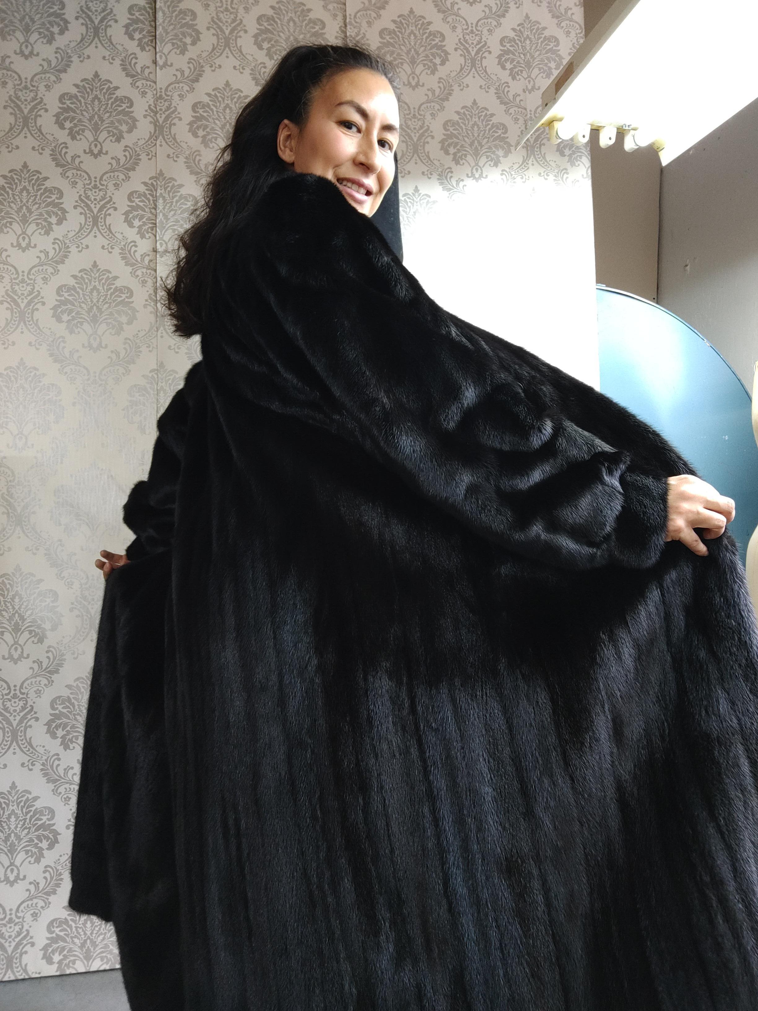 PRODUCT DESCRIPTION:

Brand new Christian Dior black mink fur coat with fluted sleeves 

Condition: New

Closure: Hooks & Eyes

Color: Black

Material: Black female opal mink 

Garment type: long length Coat

Sleeves: Dolman with fluted