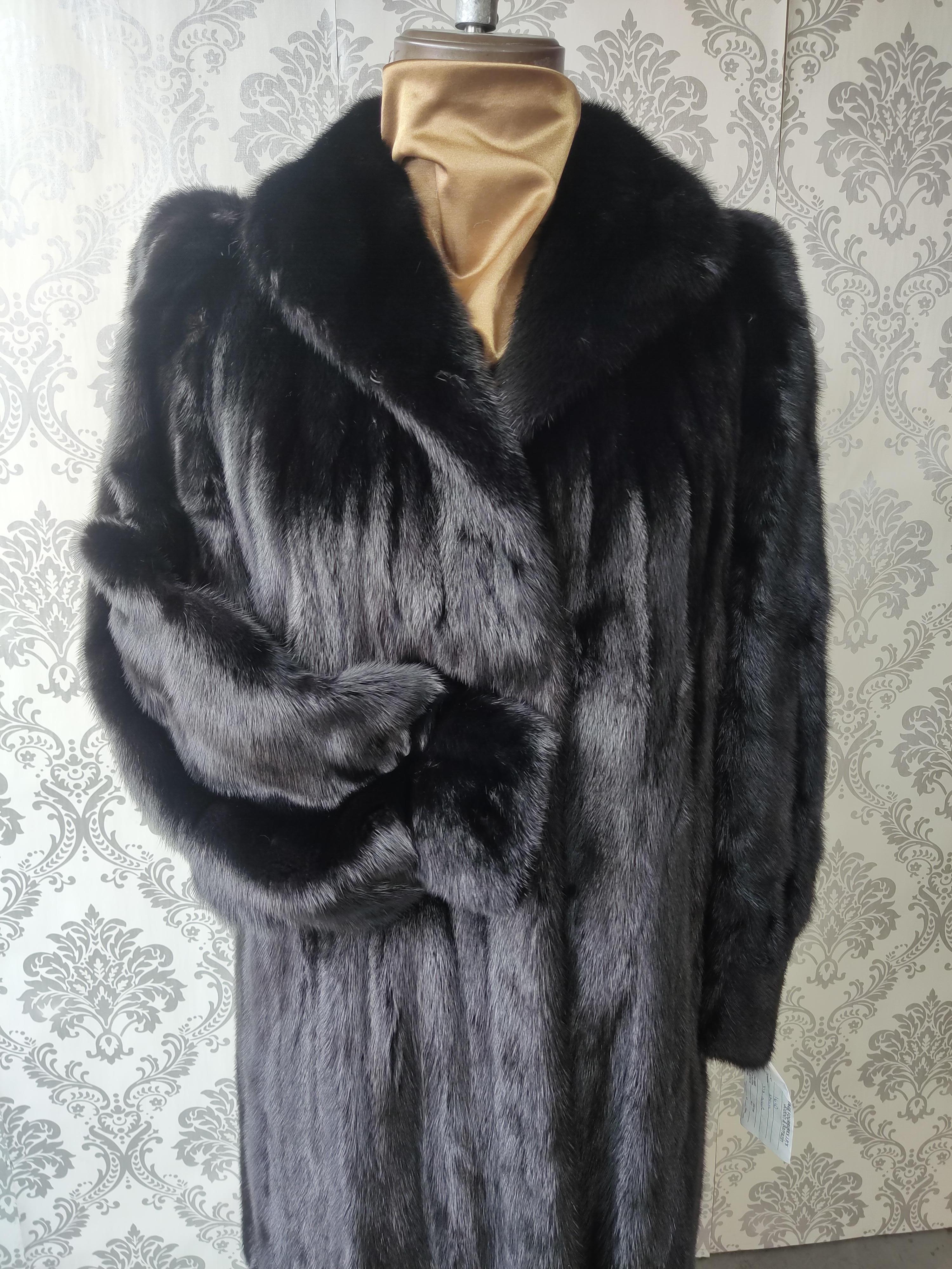 PRODUCT DESCRIPTION:

Brand new Christian Dior black mink fur coat with fluted sleeves 

Condition: New

Closure: Hooks & Eyes

Color: Black

Material: Black female opal mink 

Garment type: long length Coat

Sleeves: Dolman with fluted