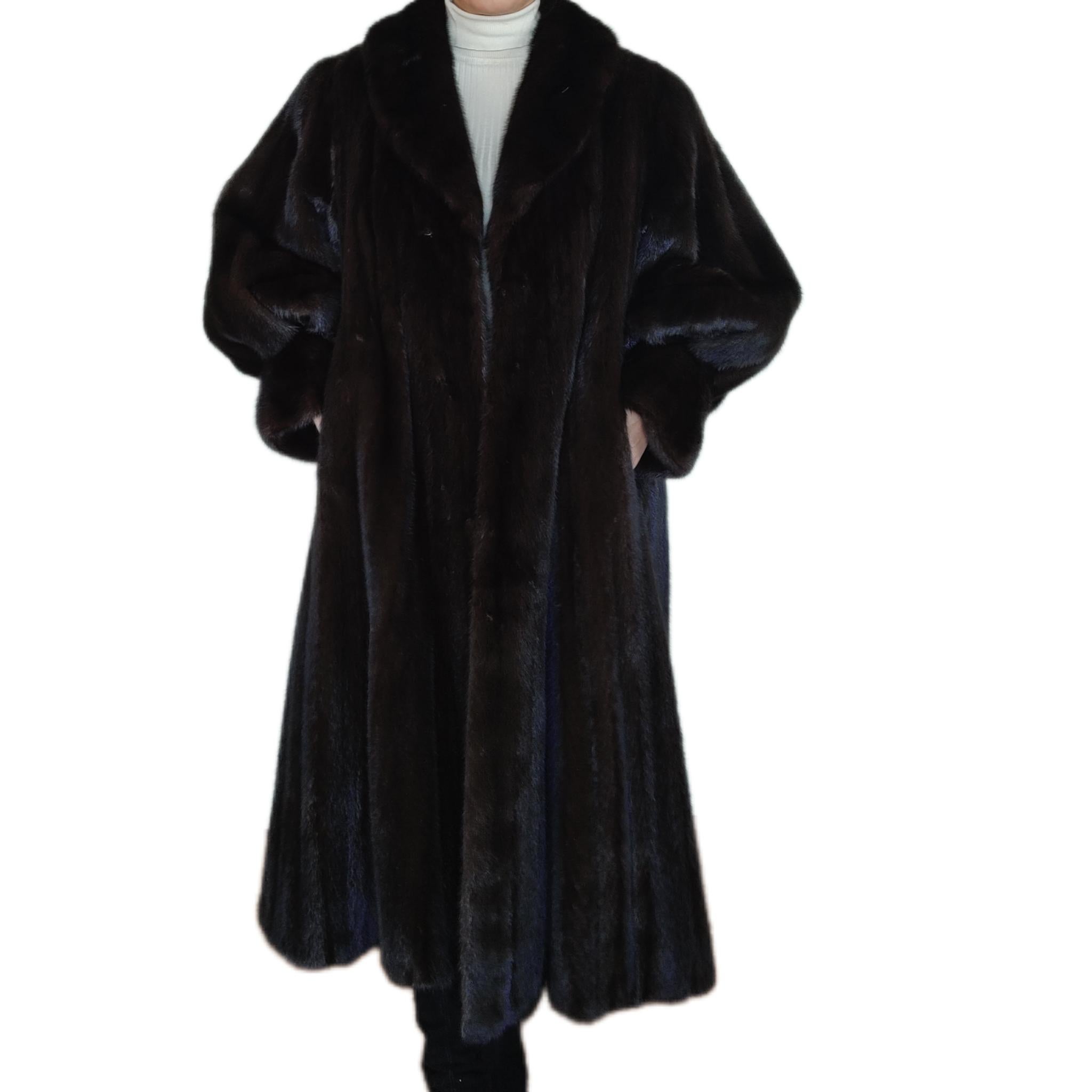 PRODUCT DESCRIPTION:

Brand new Christian Dior black mink fur swing coat with fluted sleeves and large swing

Condition: New

Closure: Hooks & Eyes

Color: Black

Material: Black opal mink 

Garment type: mid-length Coat

Sleeves: Dolman with fluted