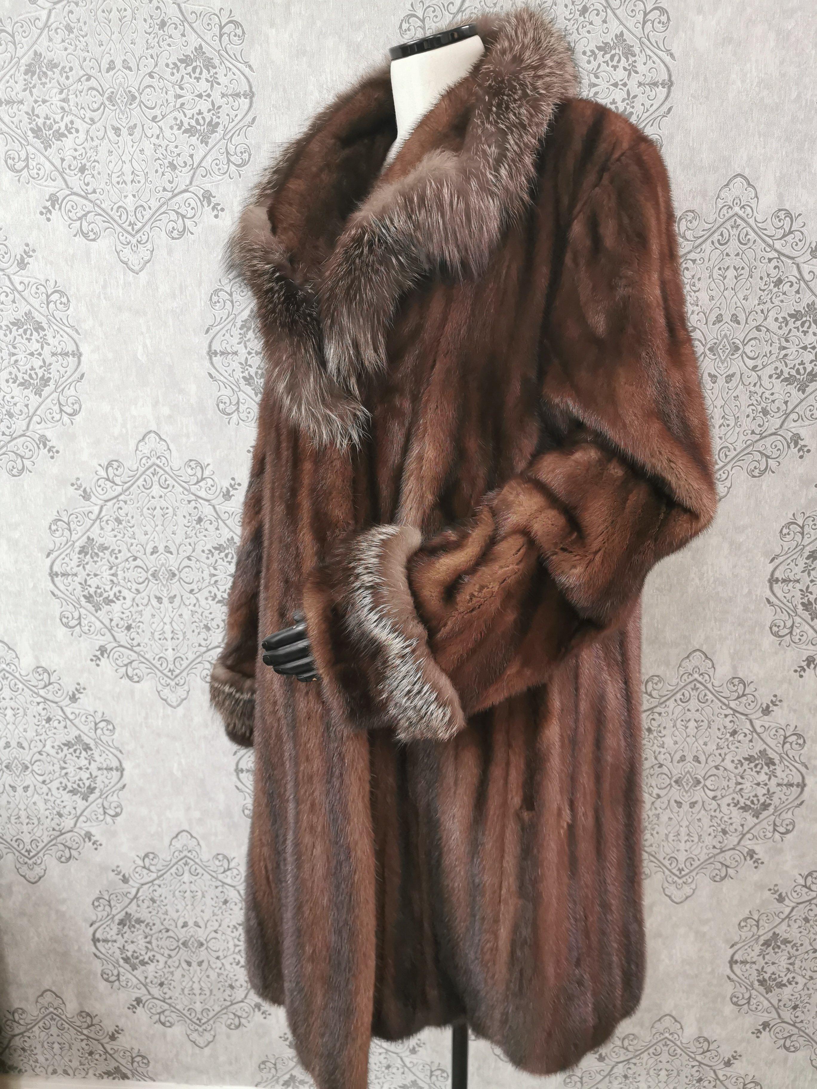 PRODUCT DESCRIPTION:

Brand New fashionable demi buff mink fur with fox fur trim in the collar and sleeves and a large sweep.

Condition: New 

Closure: Hooks & Eyes

Colour: Demi Buff

Material: Demi Buff Mink

Garment type: Swing Coat

Sleeves: