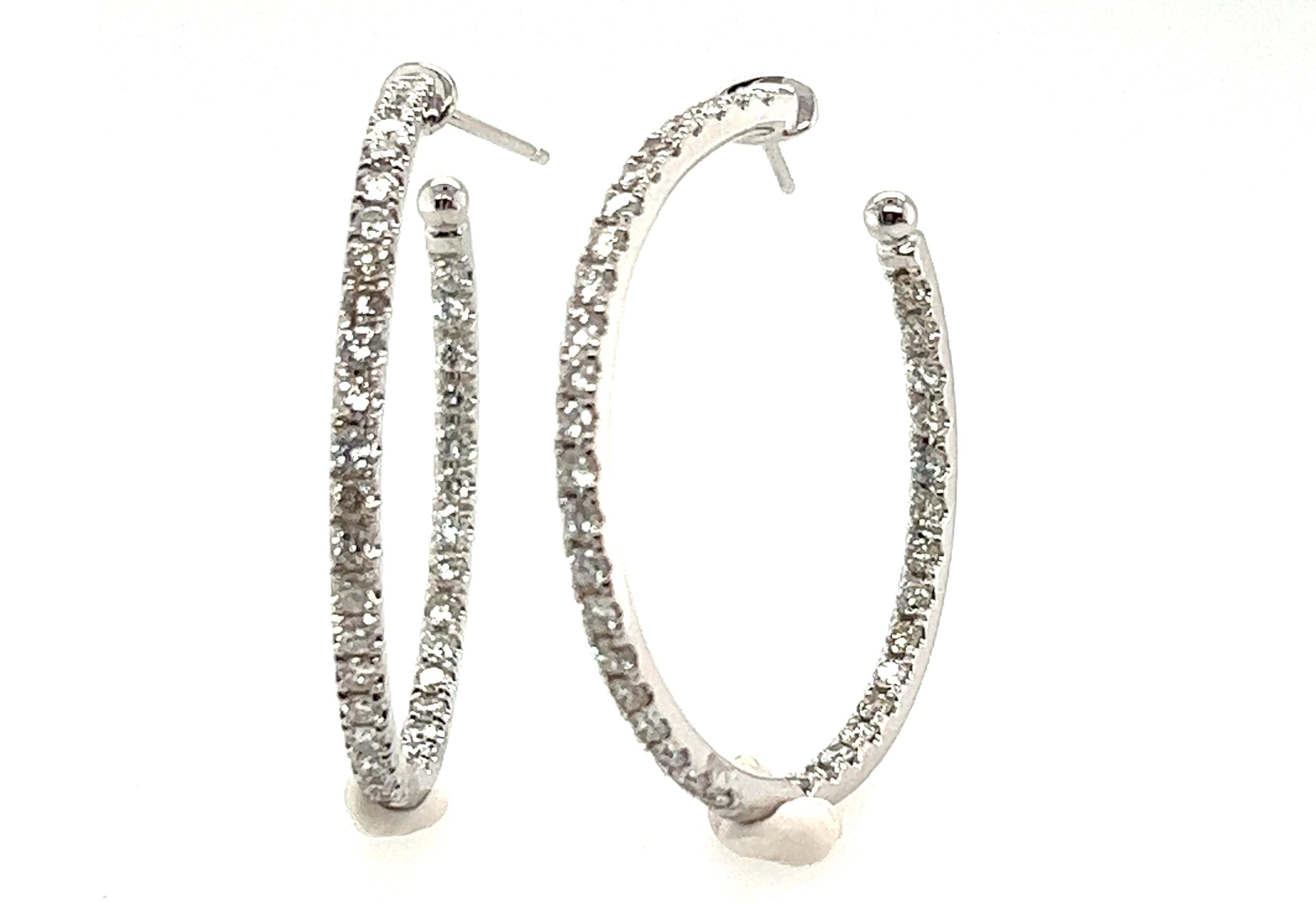 Brand New Diamond Hoop Earrings 1.96cttw 14K White Gold


Featuring 74 Genuine Natural G-H/VS-SI Round Brilliant Diamonds

Clean and Colorless Diamonds

Absolutely Stunning

Getting that 2ct Total Weight look for less

100% Natural Diamonds

1.96