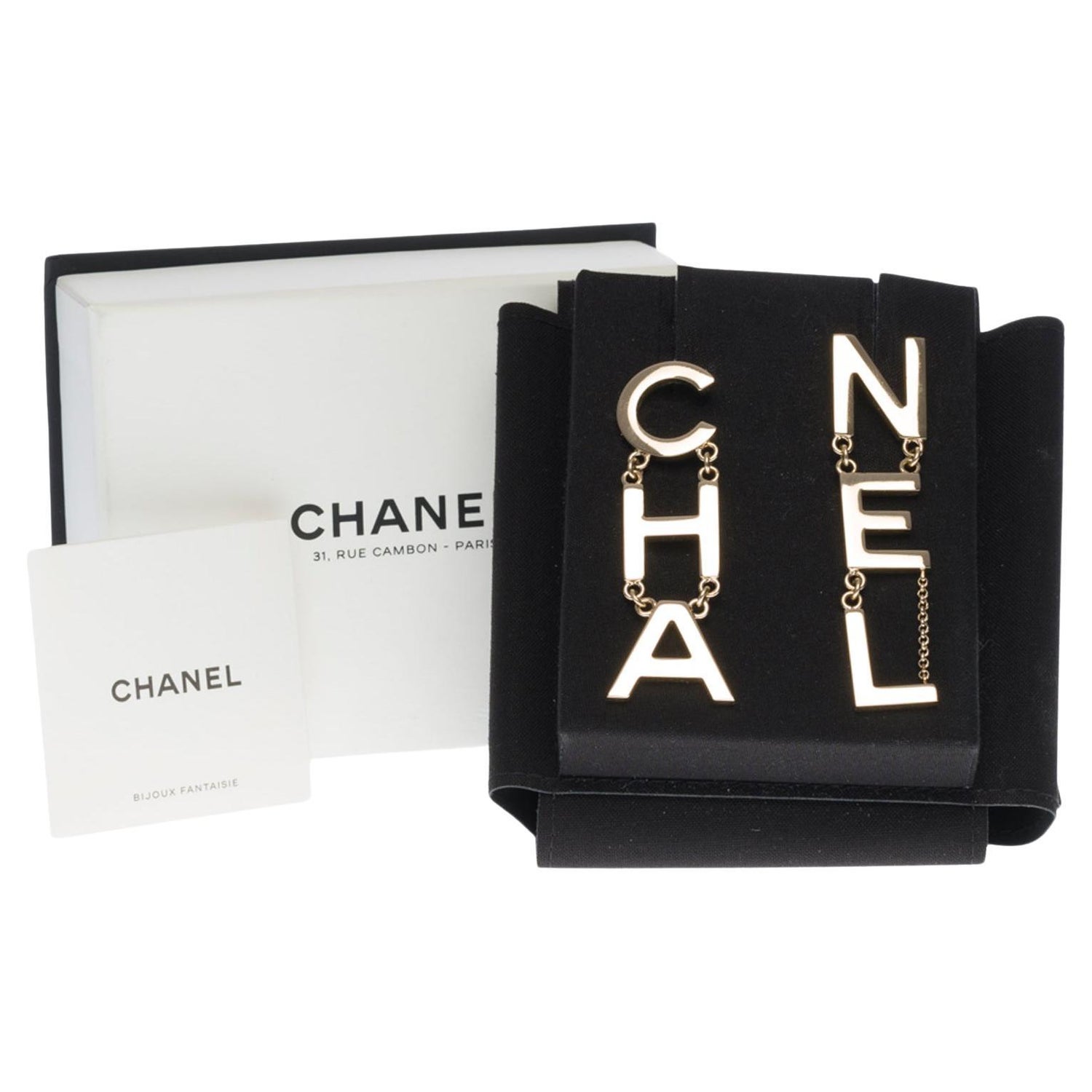 Chanel CHA NEL Crystal Logo Earrings Golden Metal ref.159658