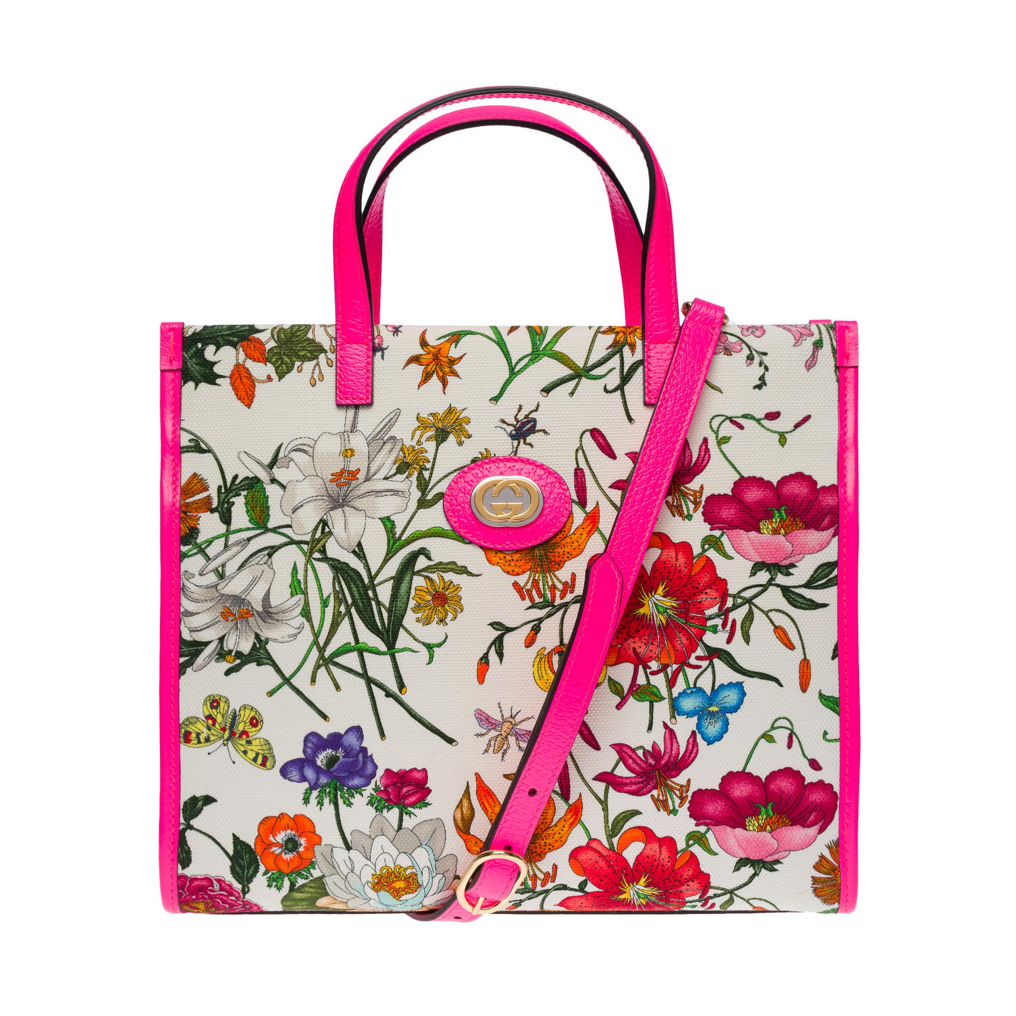 GUCCI Flora in Canvas and Leather with Nested G-Tote
Striking, playful and functional, this Flora tote comes from Gucci and offers style goals with every swing and spin. Made in Italy, it has been meticulously made from multicolored floral printed