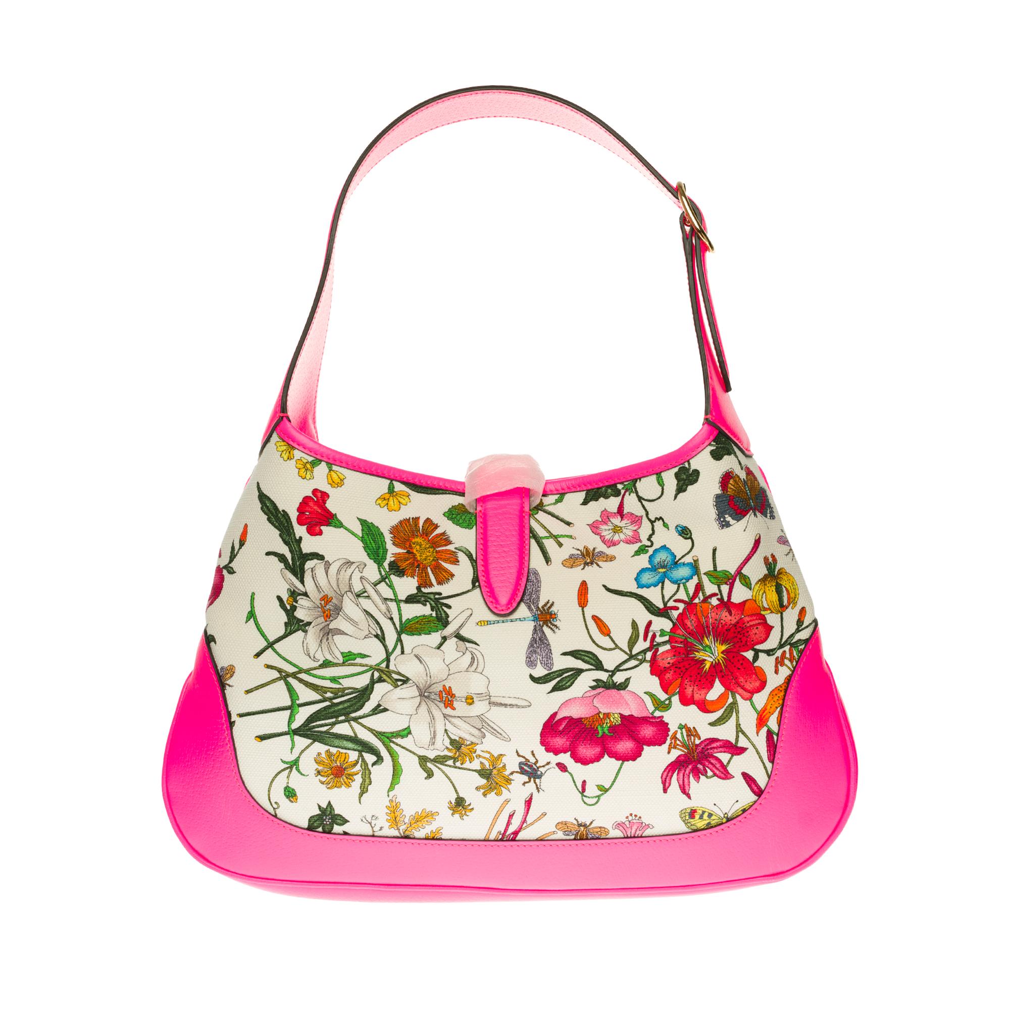 Gucci Jackie Flora Bag

Floral shoulder bag with adjustable shoulder strap, leather hardware and floral print.
Colour: Pink.
Manufacture: Italy
Composition
Exterior: 100% canvas, 100% leather
Lining: 100% Cotton, 100% Linen

Actions:
Width 33,5