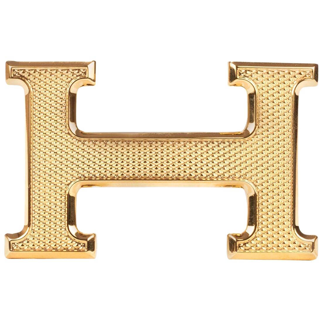 Brand new Hermès belt buckle model "Guillochée" in shiny gold !