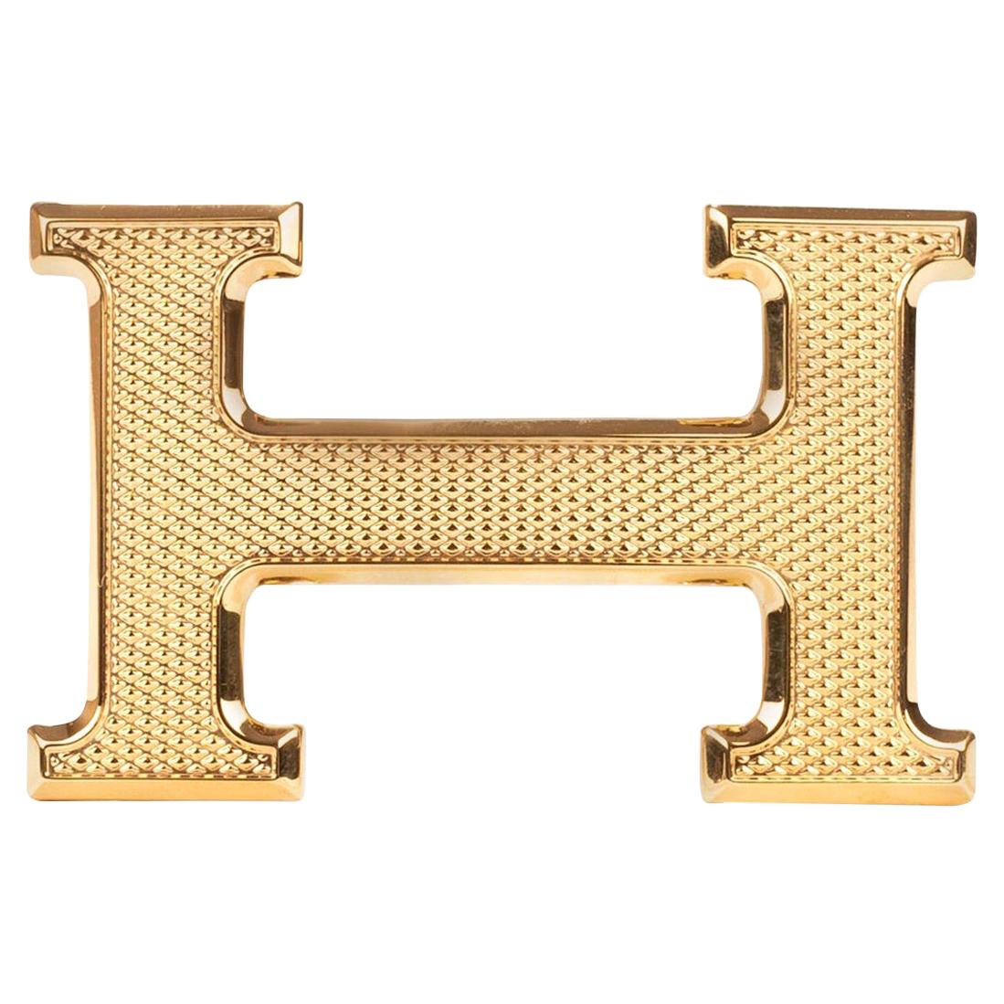 Brand new Hermès "Guillochée" belt buckle  in shiny gold metal 